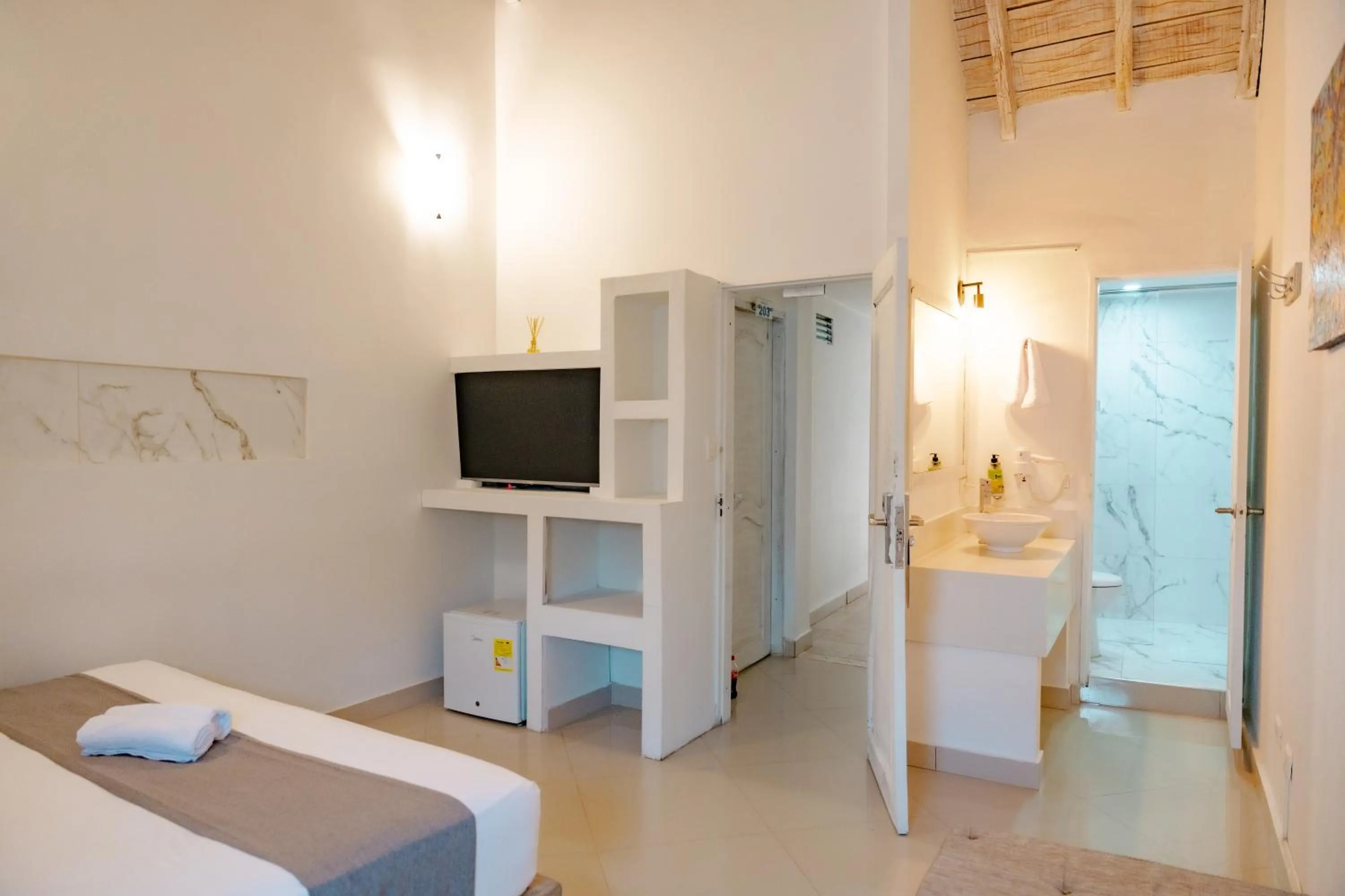 Photo of the whole room, Bed in Casa Amanzi Cartagena by Bernalo Hotels