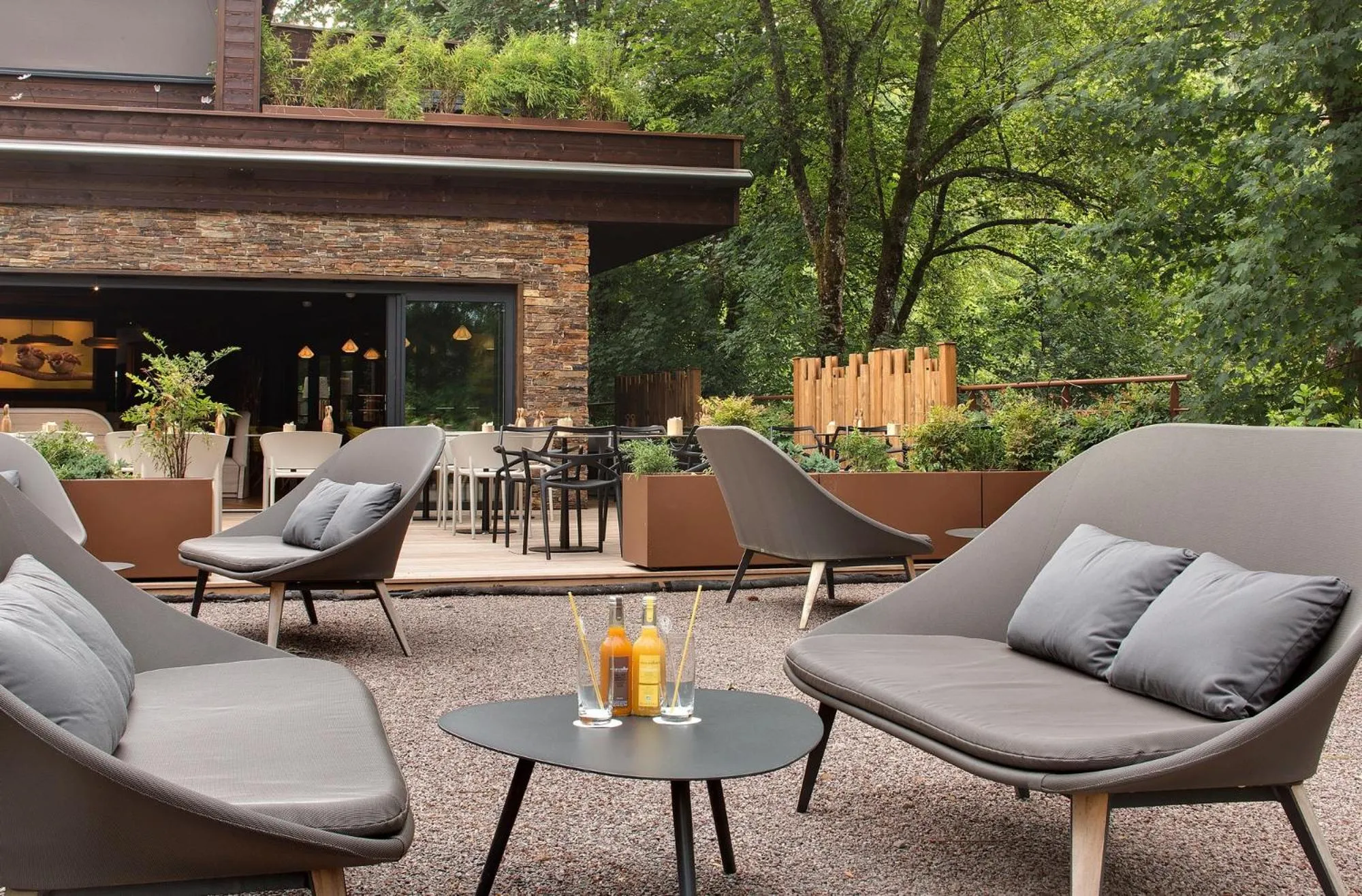Balcony/Terrace in LA CHENEAUDIÈRE - Hôtel Spa - Relais & Châteaux - Restaurant étoilé