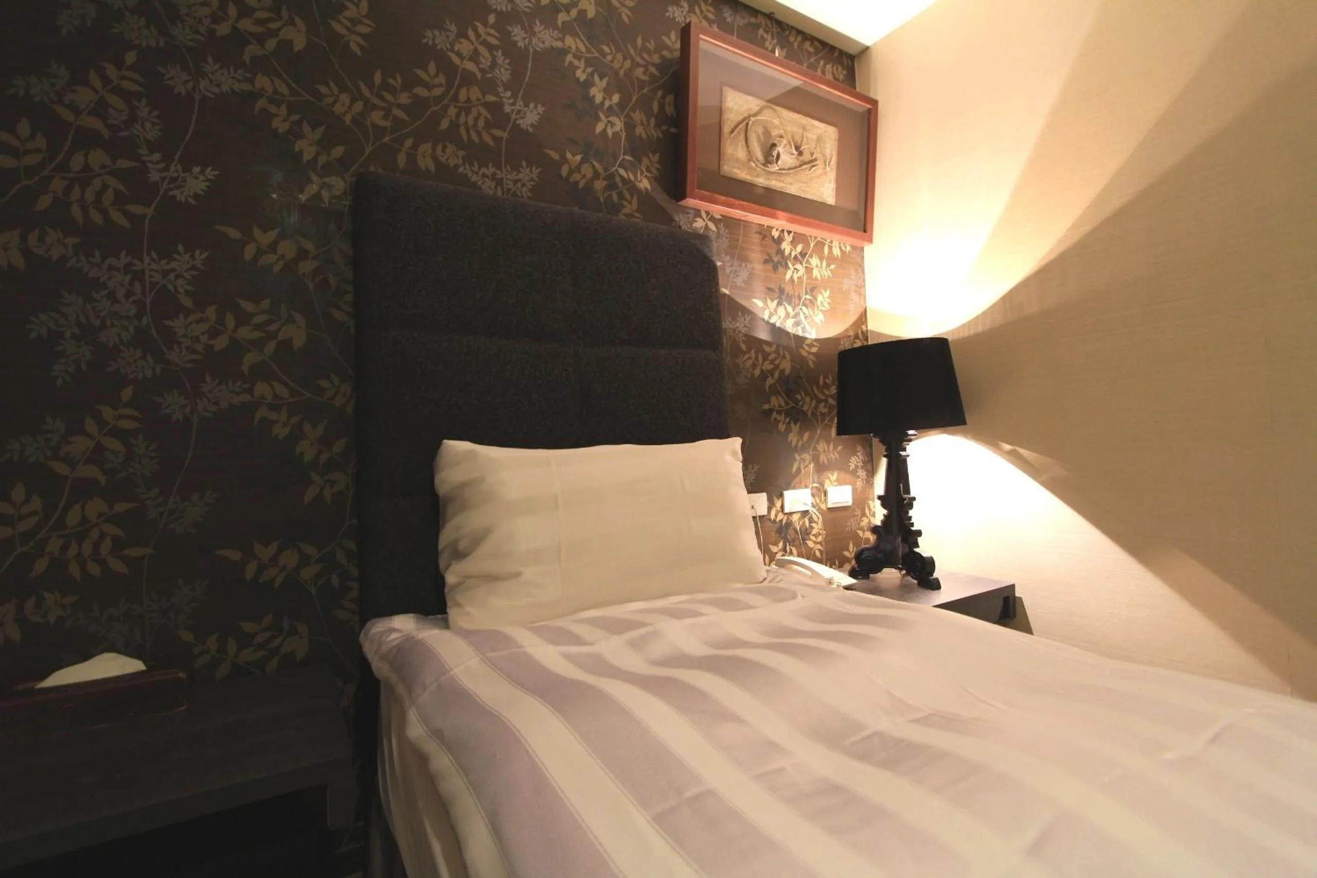 Bed in Shan-Yue Hotspring Hotel