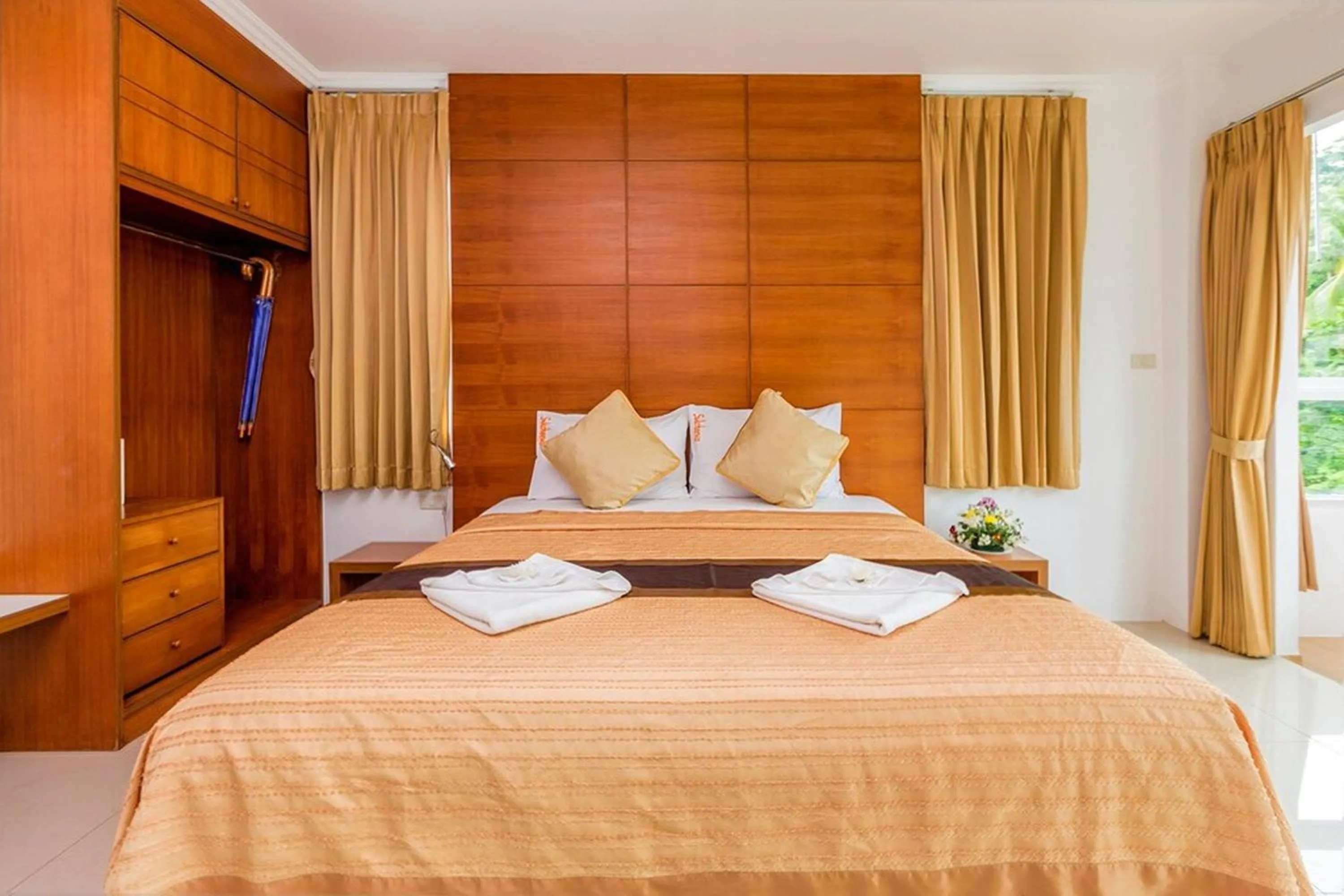 Bed in Sukcheewa Residence Phuket
