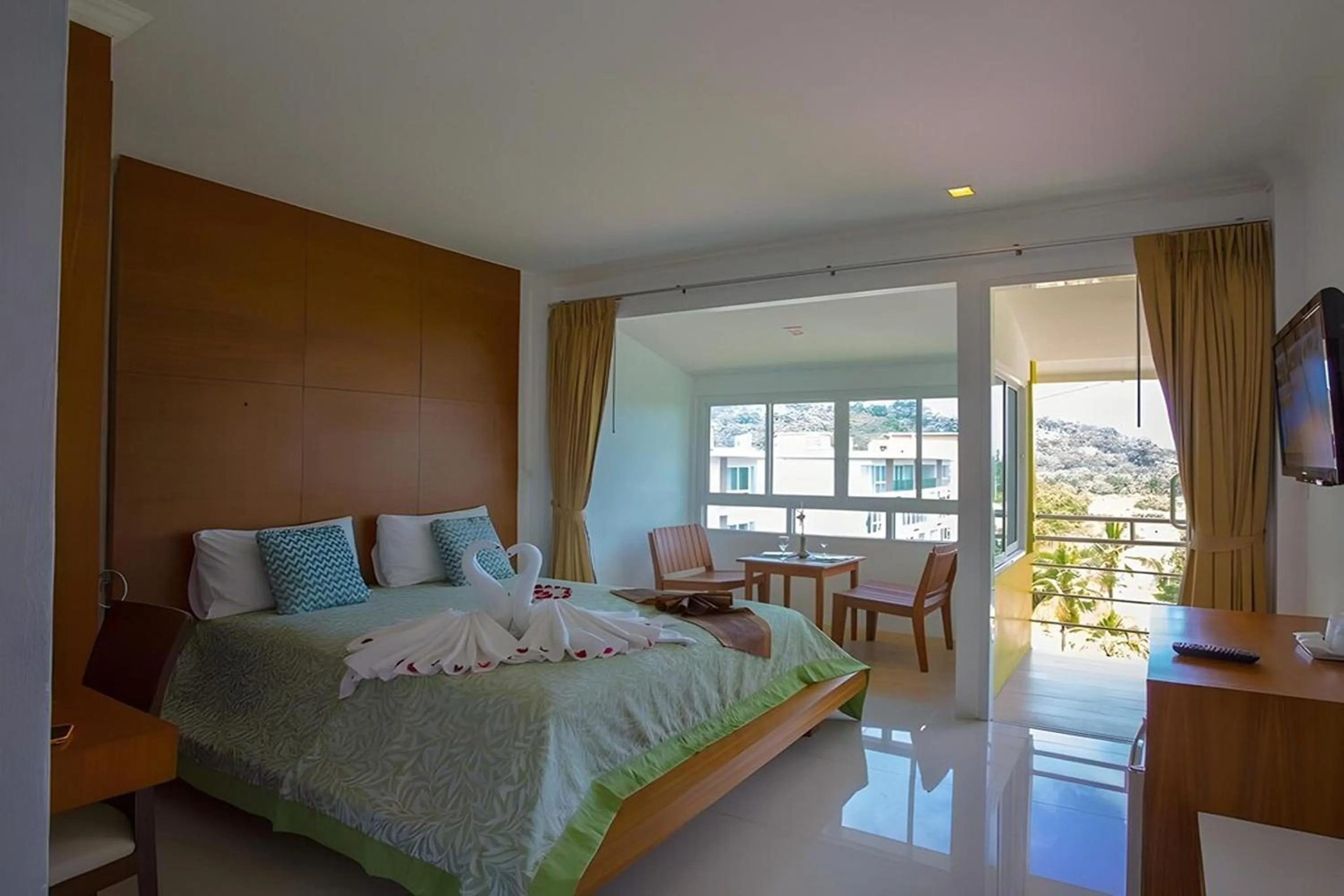 Bed in Sukcheewa Residence Phuket