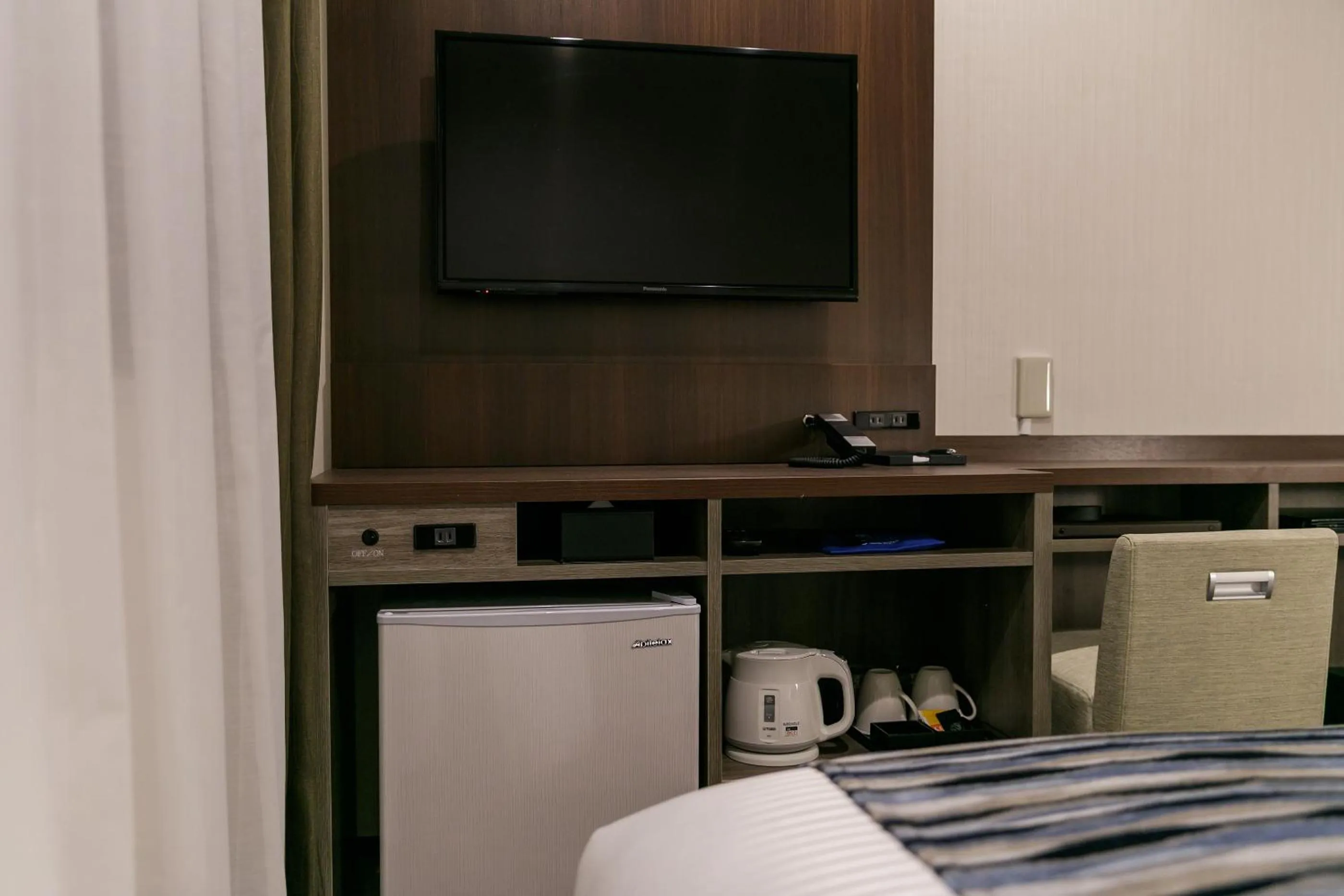 Photo of the whole room, TV/Entertainment Center in Cent Inn Nibankan