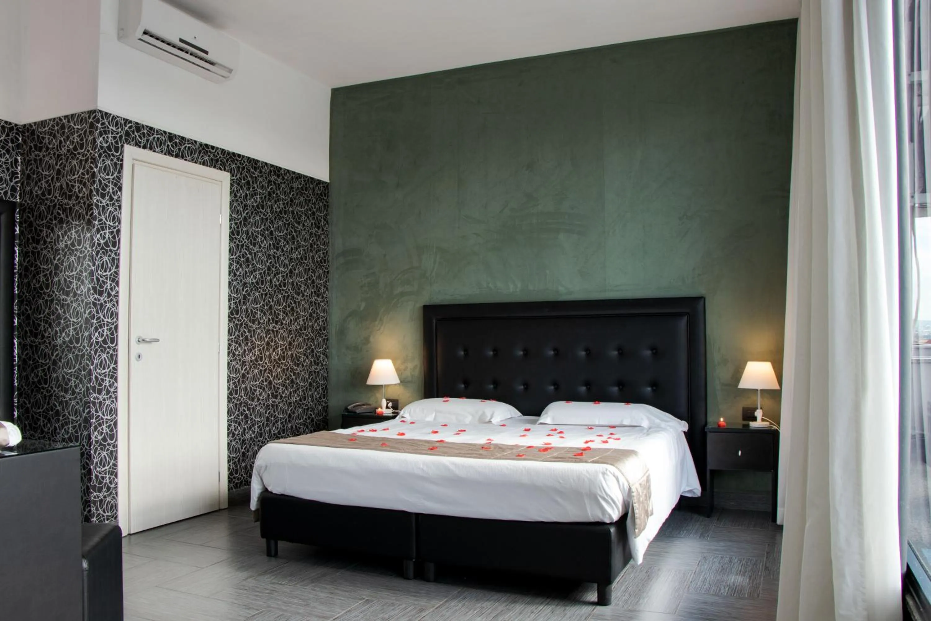 Bed in Hotel Masaniello Luxury