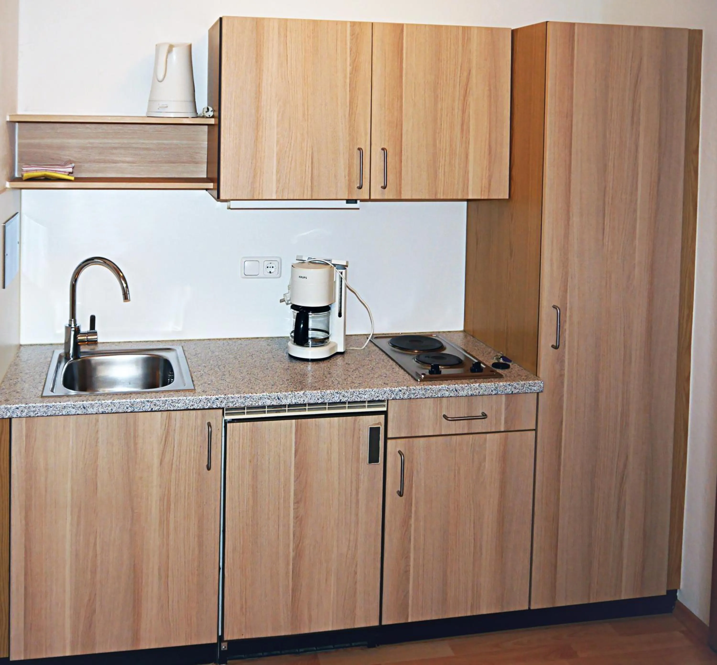 Kitchen or kitchenette in Hotel Fortuna