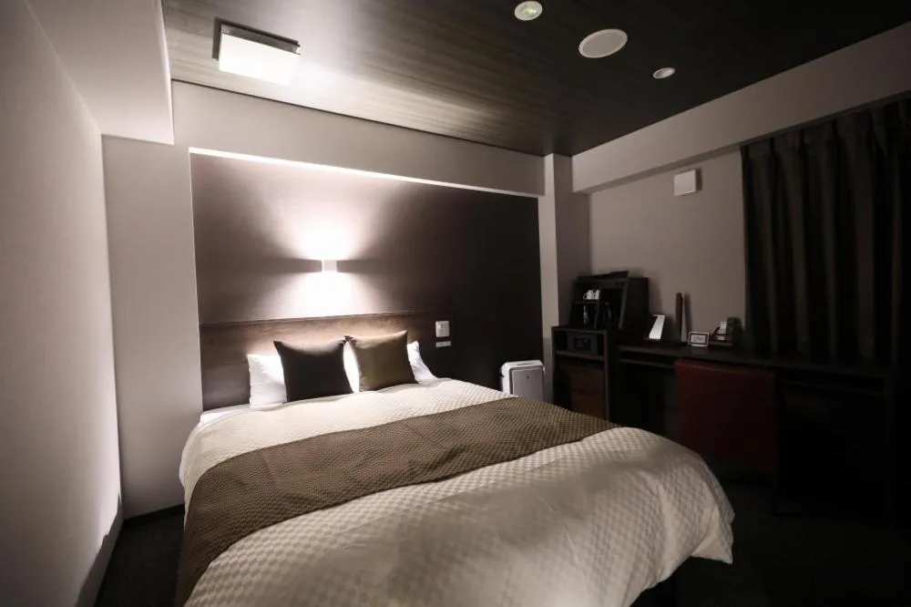 Bed in The Celecton Tsuchiura Ekimae