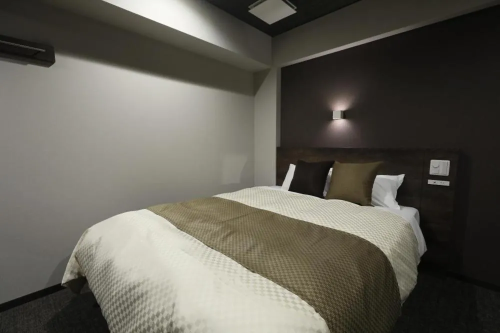 Bed in The Celecton Tsuchiura Ekimae