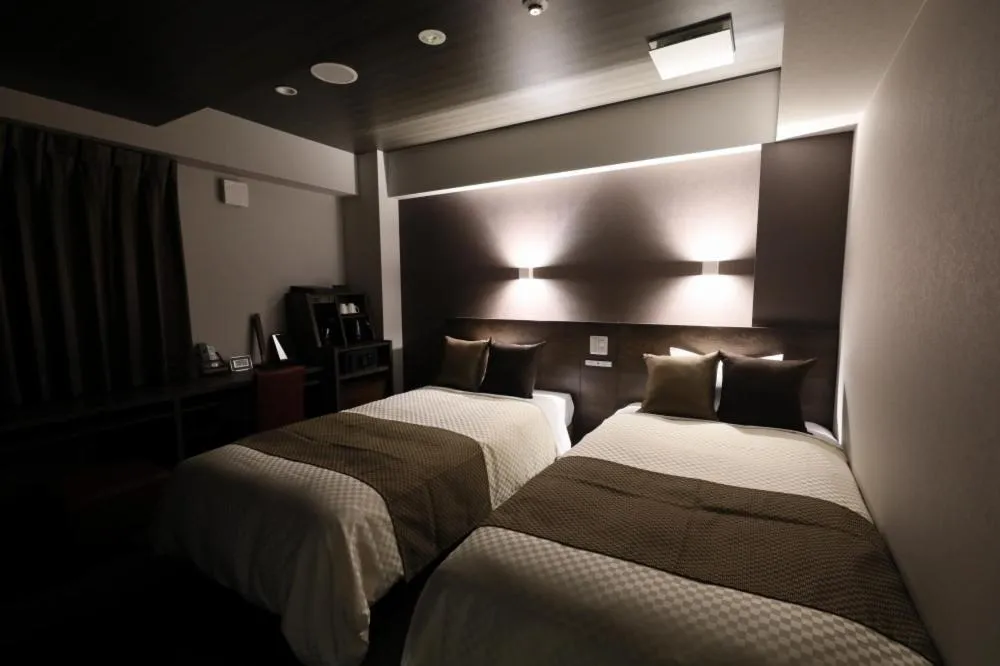 Bed in The Celecton Tsuchiura Ekimae