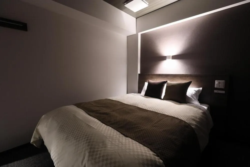 Bed in The Celecton Tsuchiura Ekimae