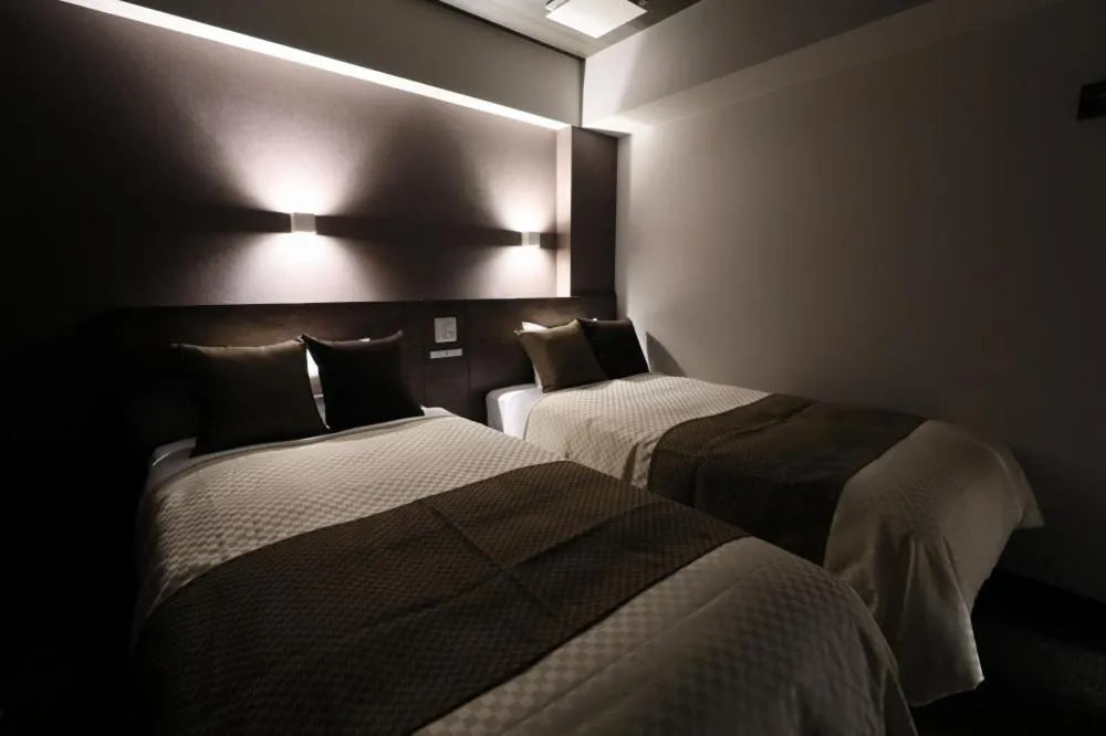 Bed in The Celecton Tsuchiura Ekimae