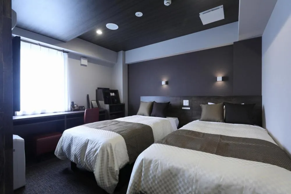 Bed in The Celecton Tsuchiura Ekimae