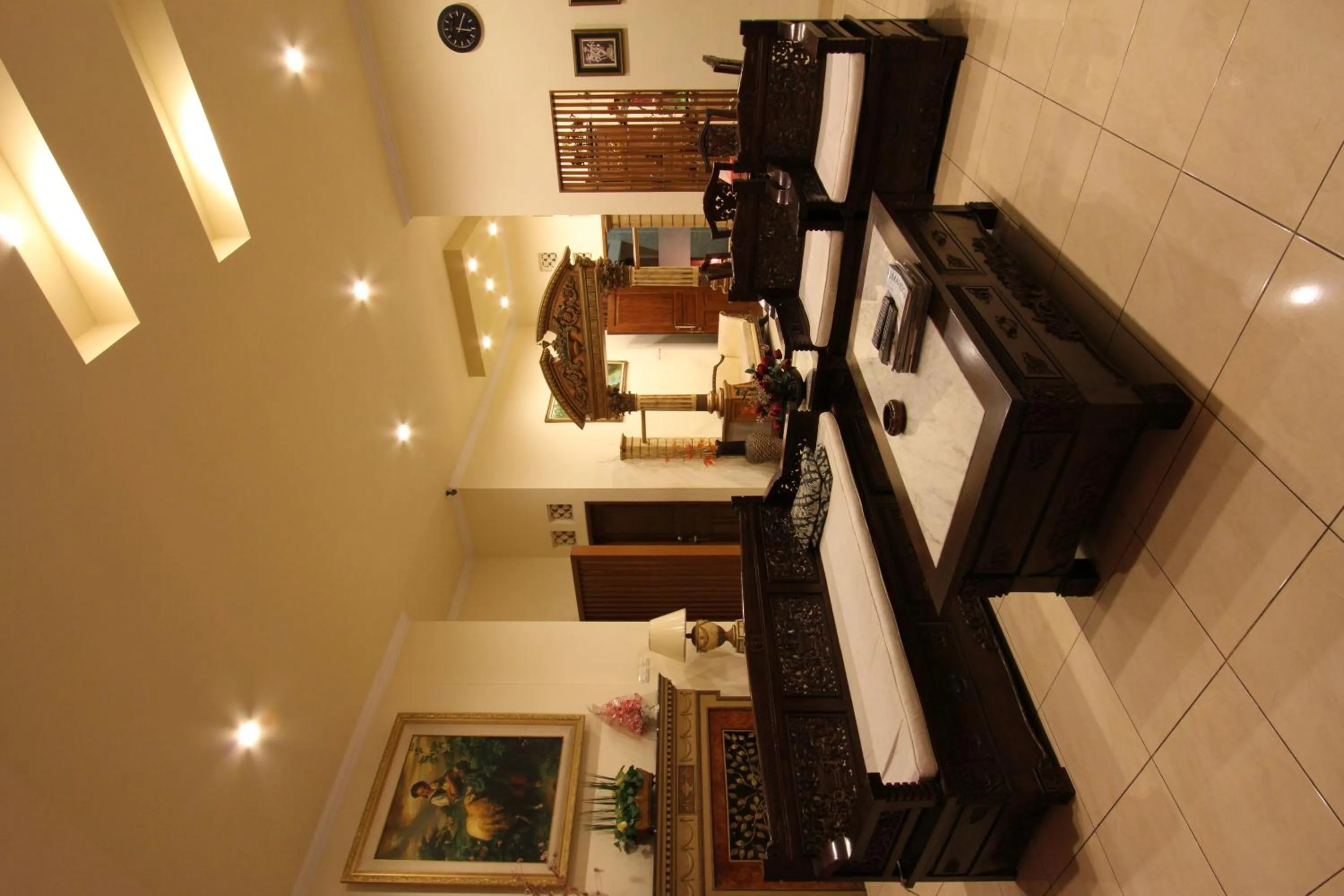 Communal lounge/ TV room in griya desa hotel & pool