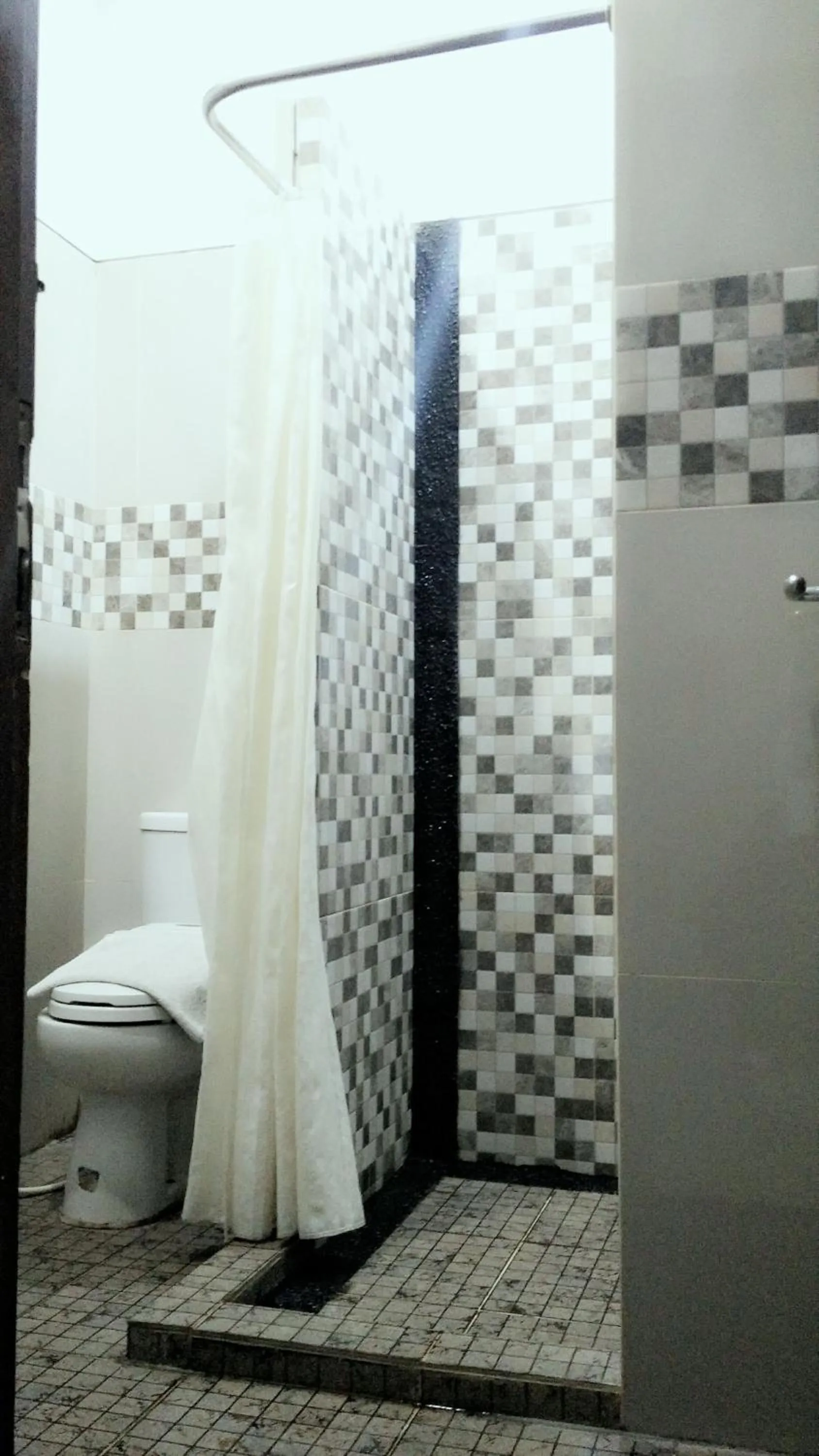 Bathroom in griya desa hotel & pool