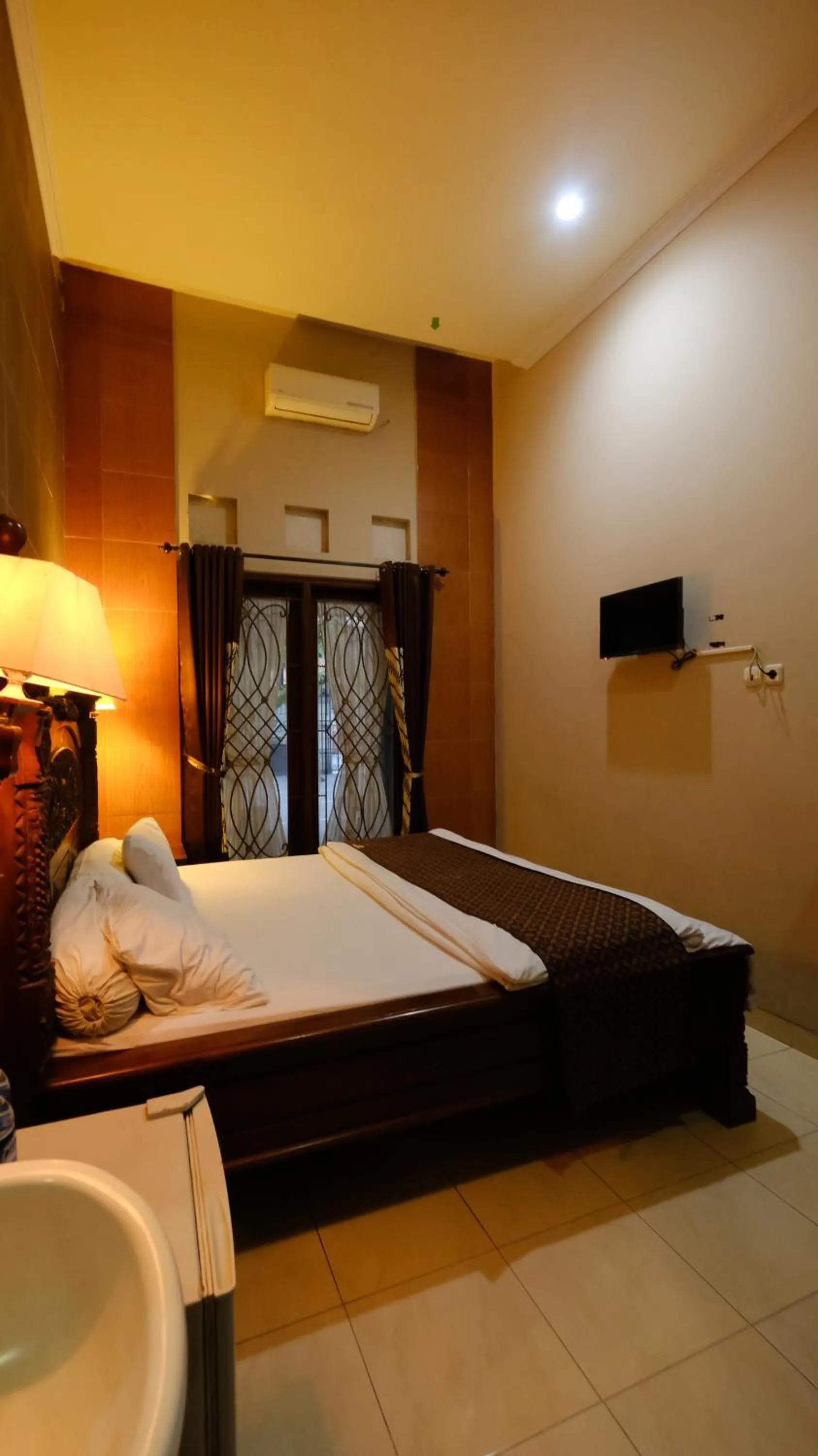Bedroom, Bed in griya desa hotel & pool