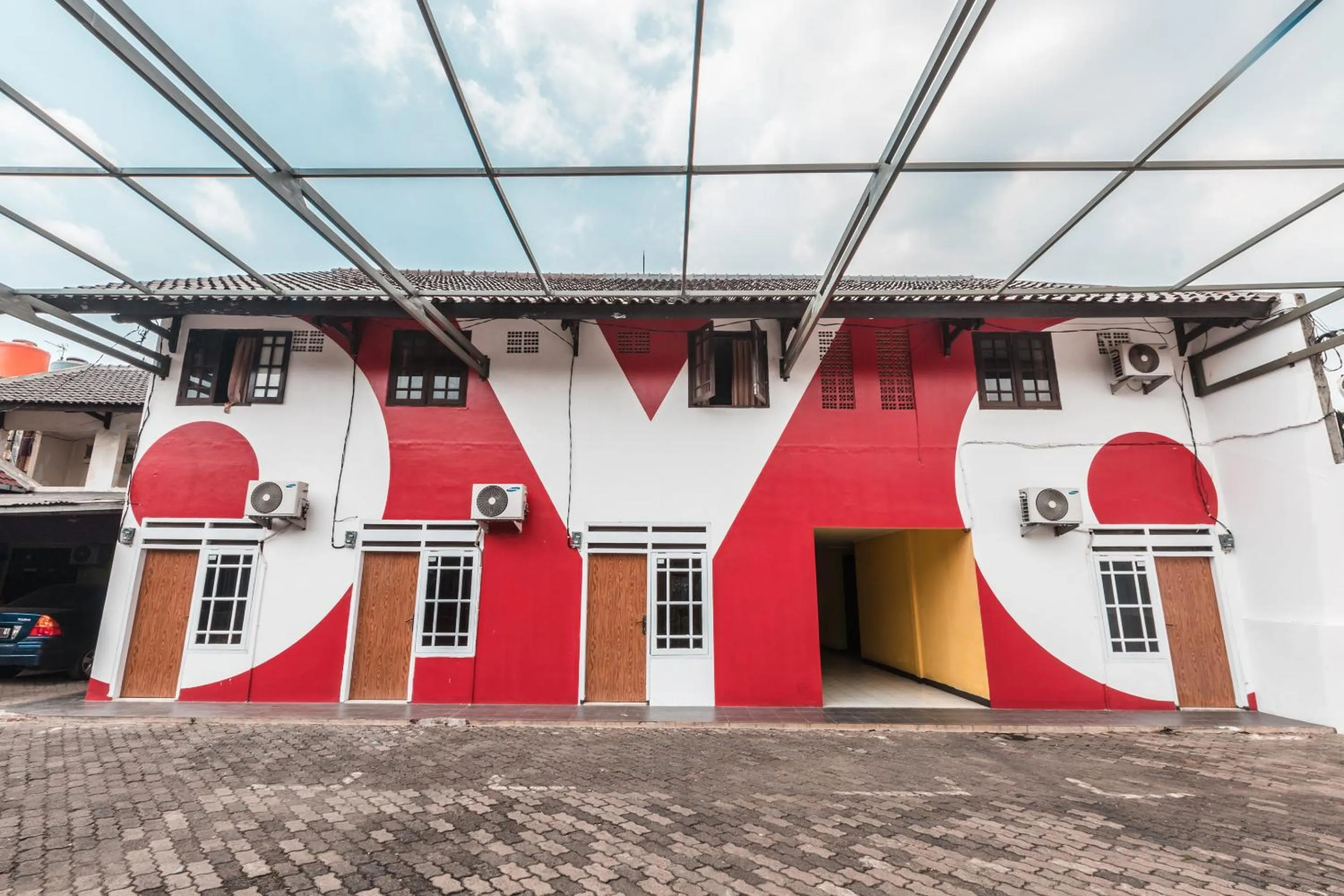 Facade/entrance in OYO 947 Angel Home Stay Syariah Near Atrium Pondok Gede, Museum Monumen Pancasila, Taman Mini