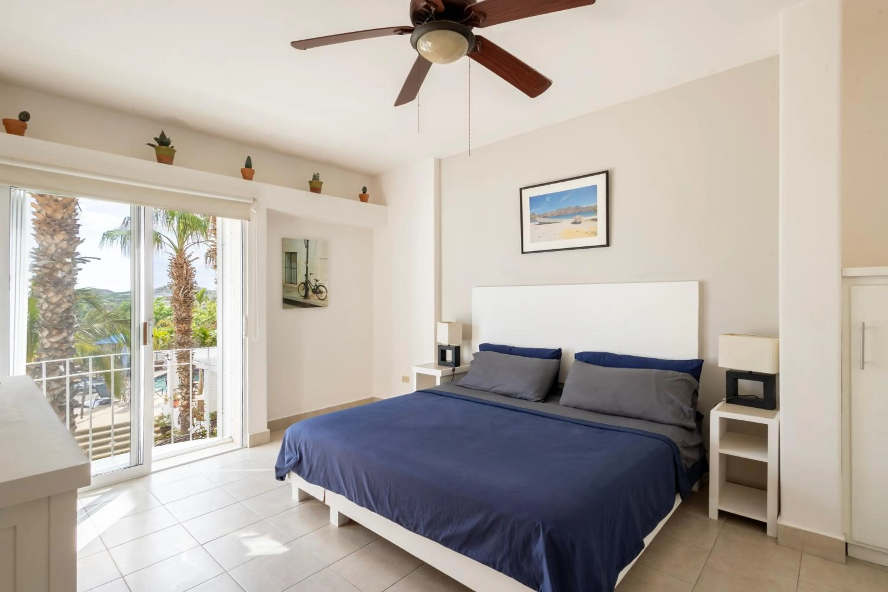 Bed in MariaMar Suites