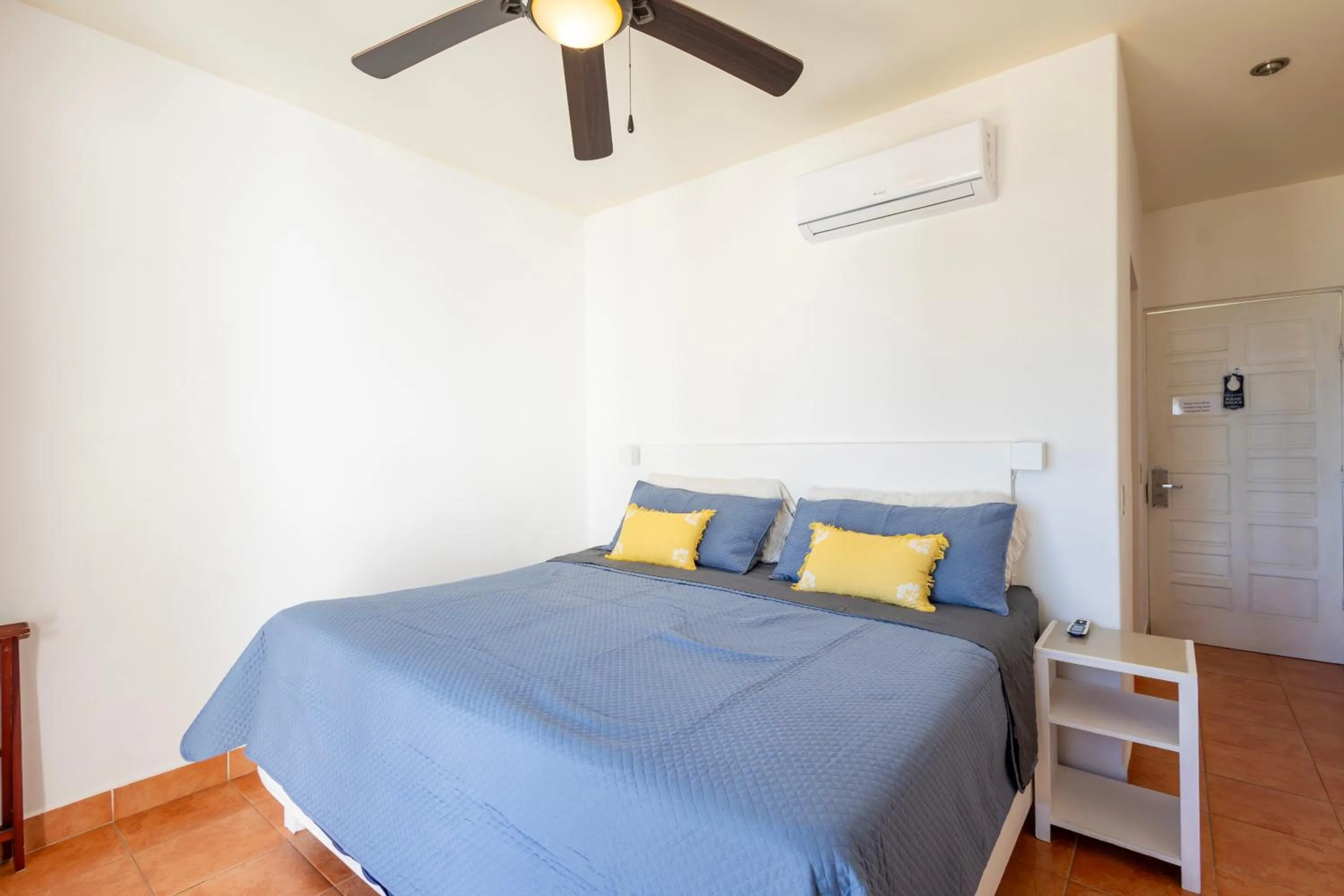 Bed in MariaMar Suites