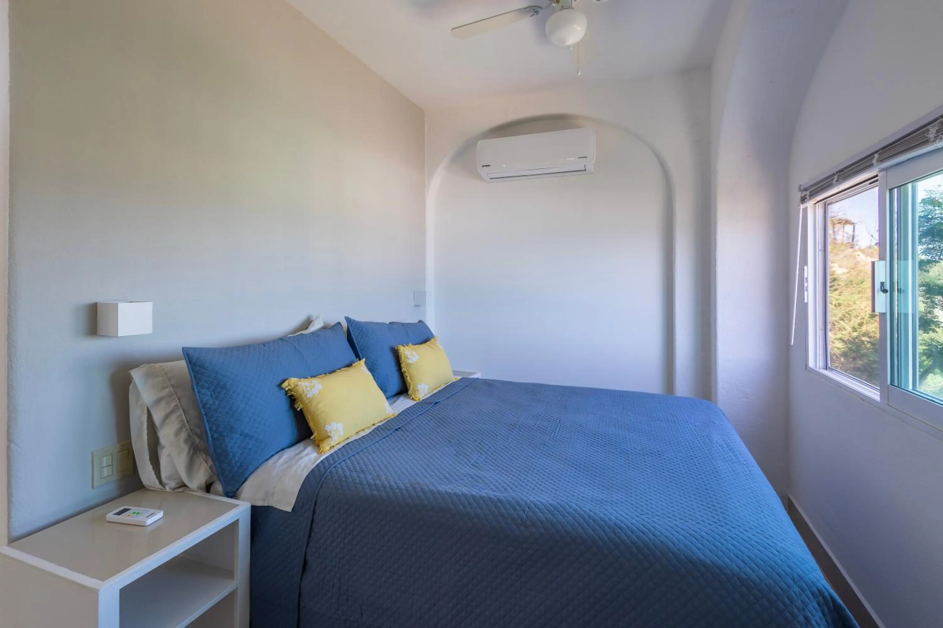 Bed in MariaMar Suites