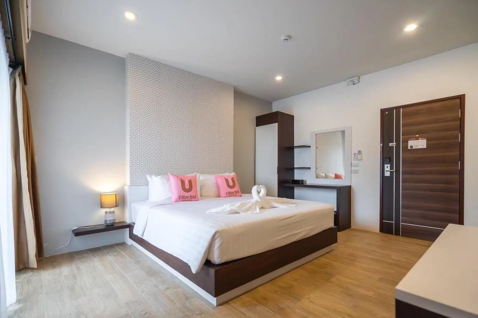 Bed in U- Homehotel Nakhonpanom