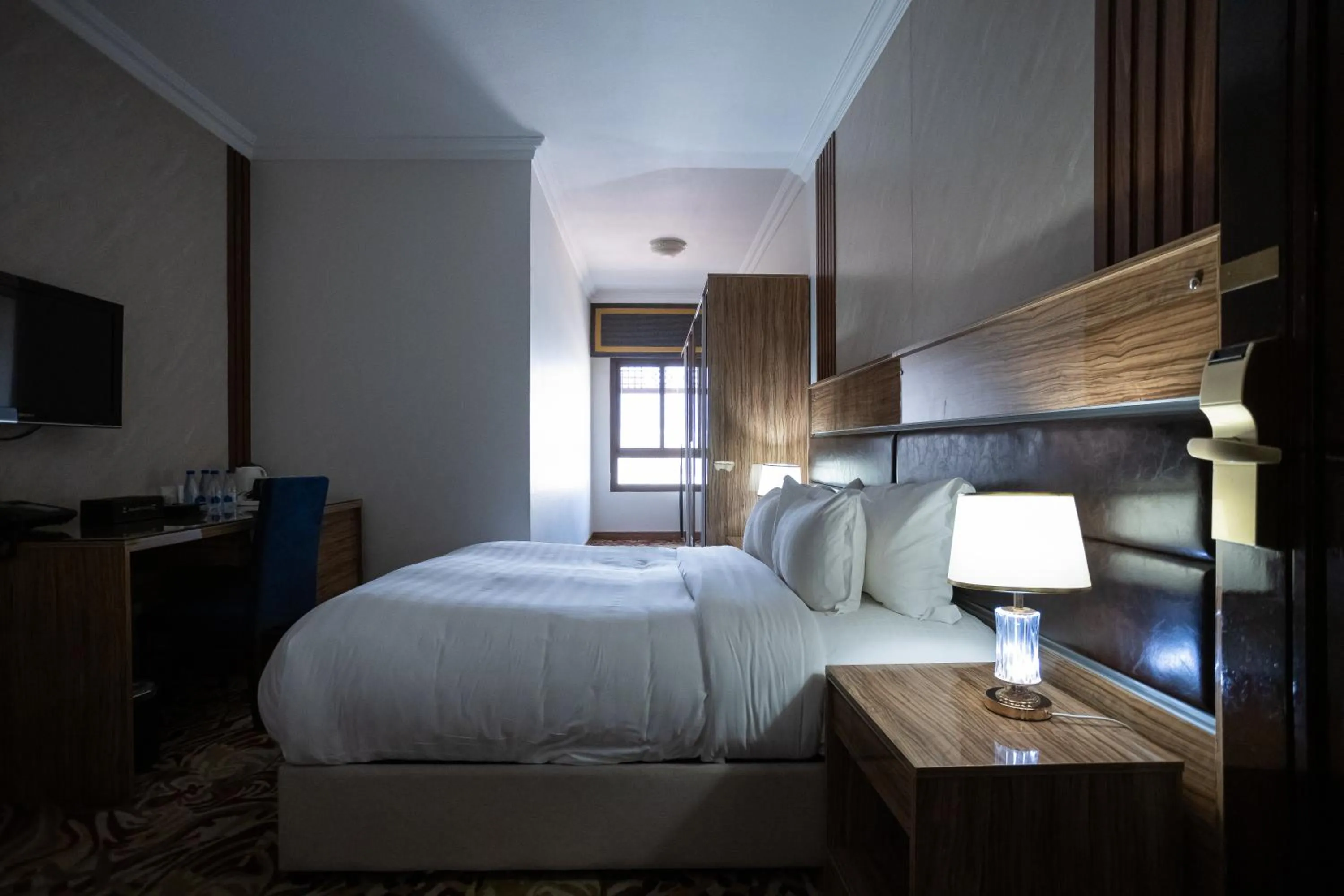 Living room, Bed in Golden Tulip Al Shakreen