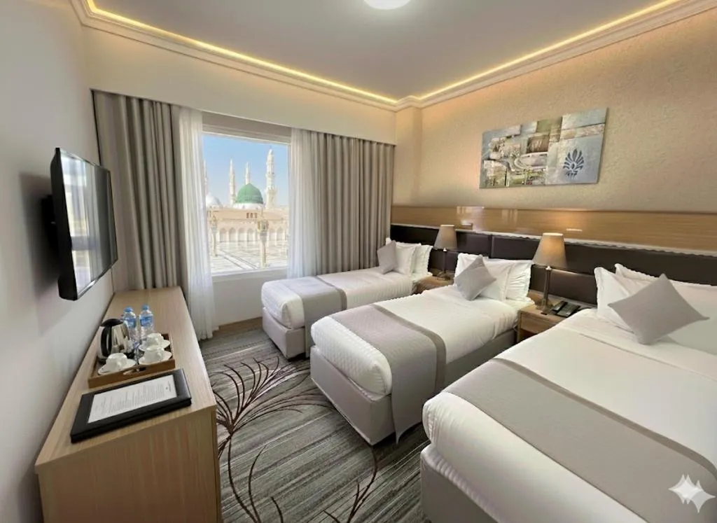 Bed in Golden Tulip Al Shakreen