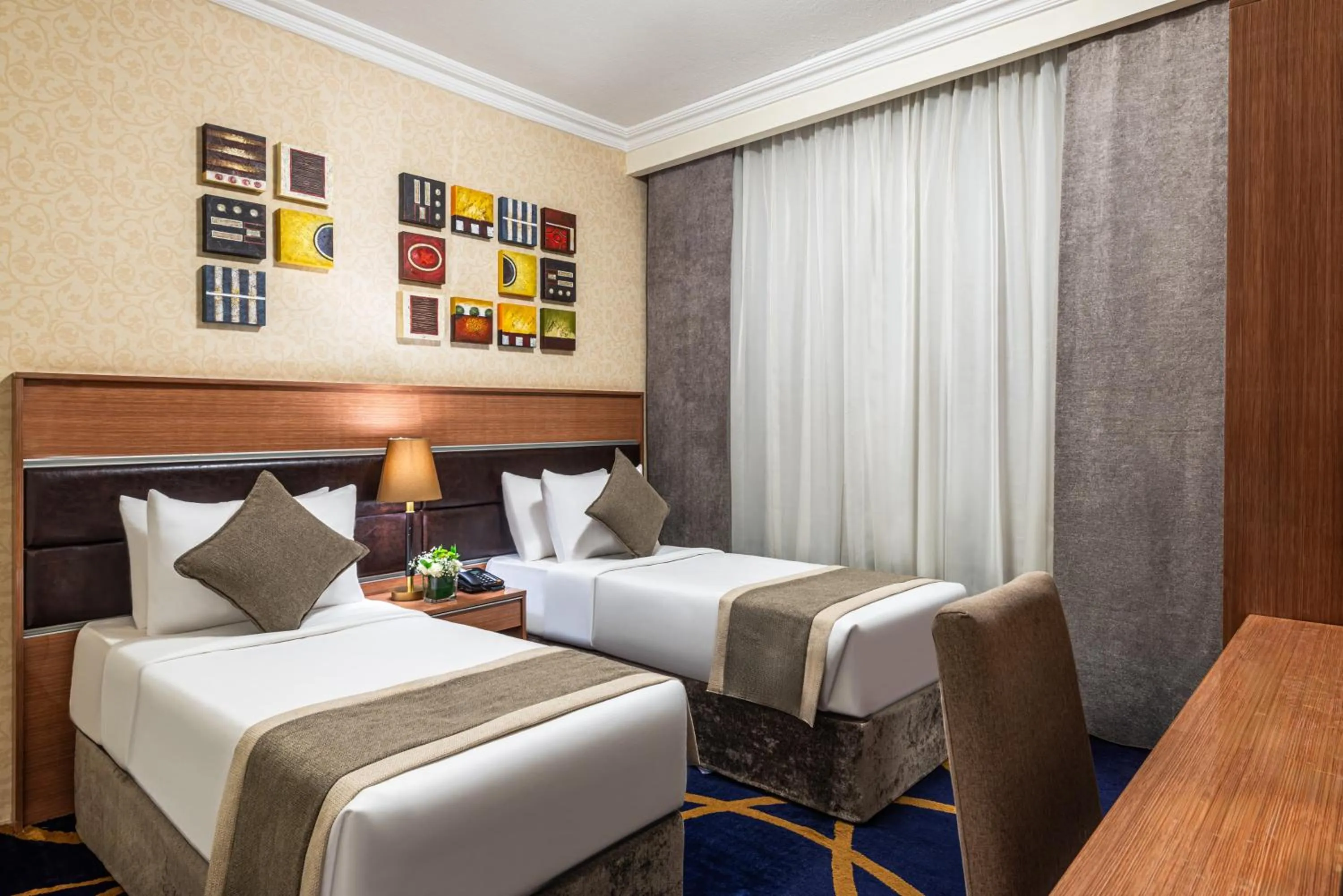 Photo of the whole room, Bed in Golden Tulip Al Shakreen