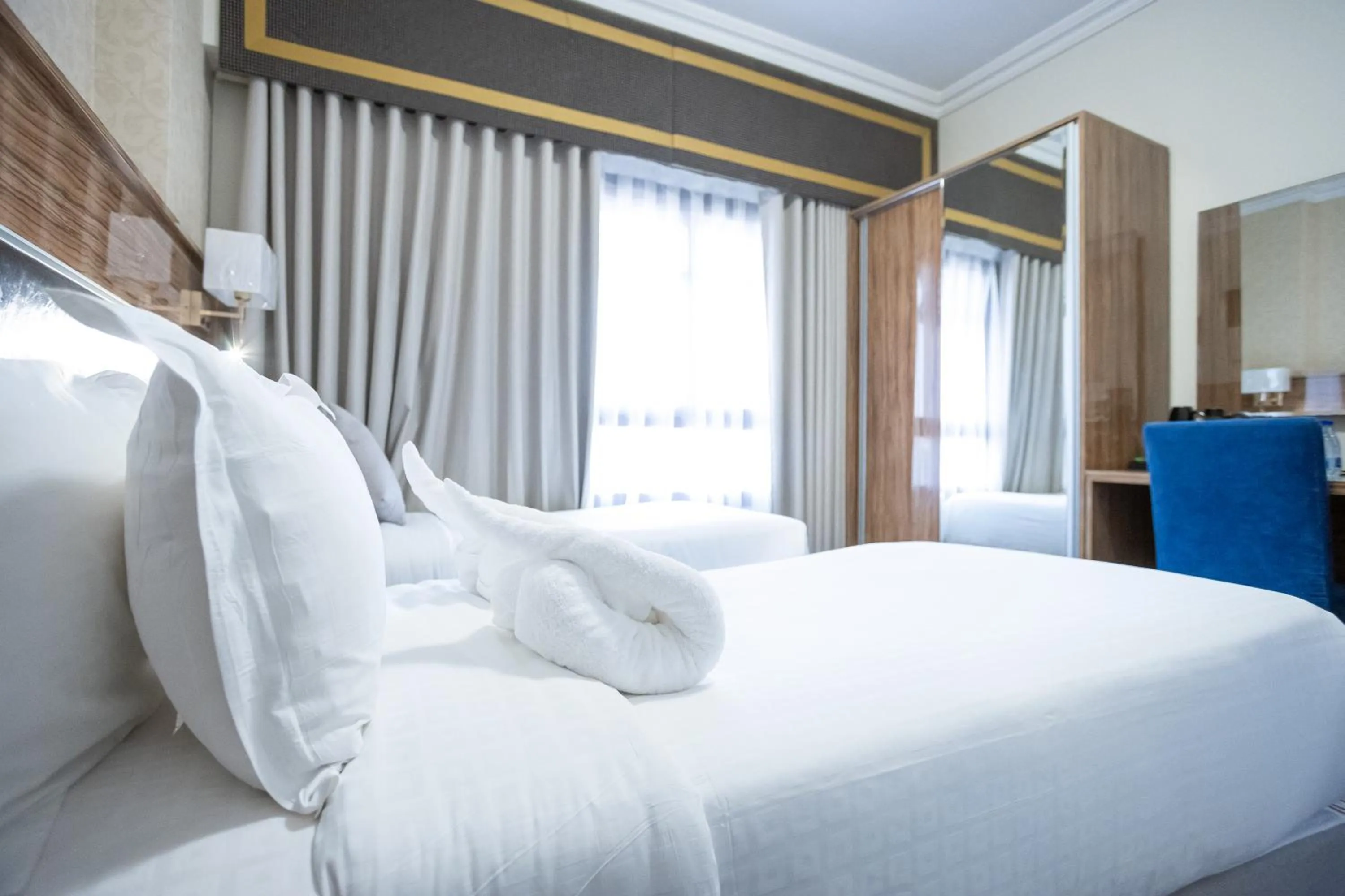 Bed in Golden Tulip Al Shakreen