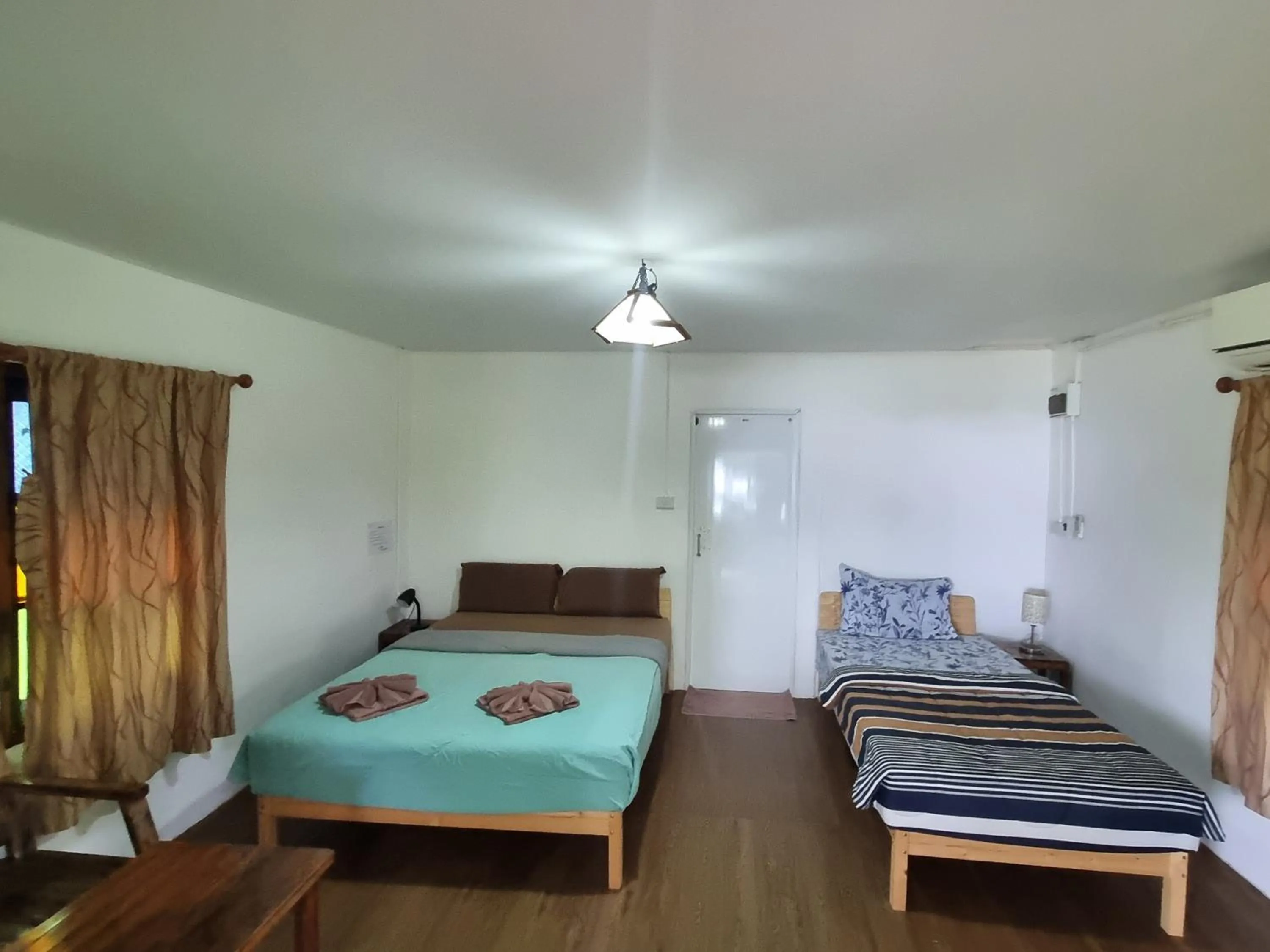 Bed in TK Beach Resort Koh Mak