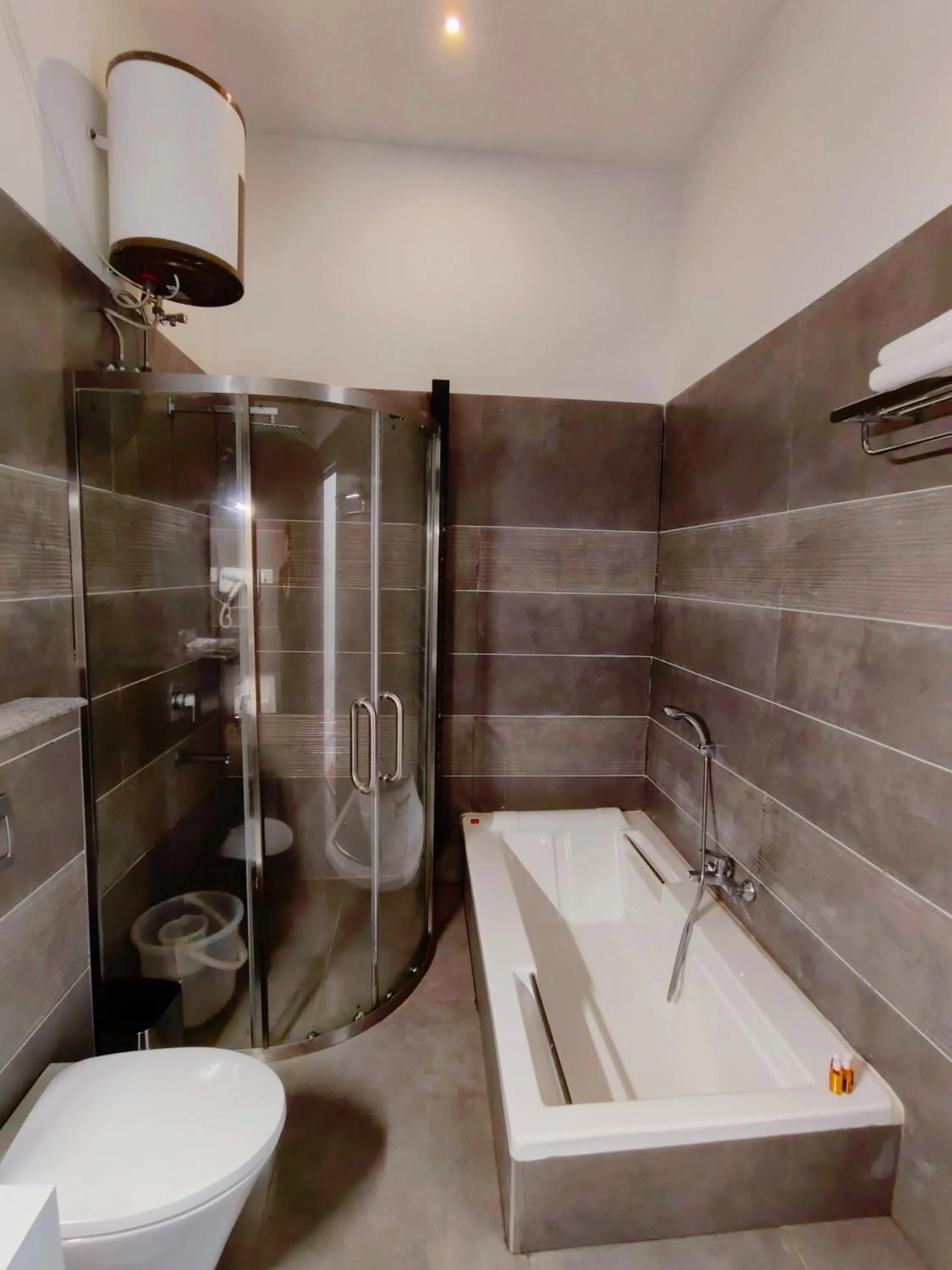 Bathroom in Mainland Resorts & Spa by Kolaahalam