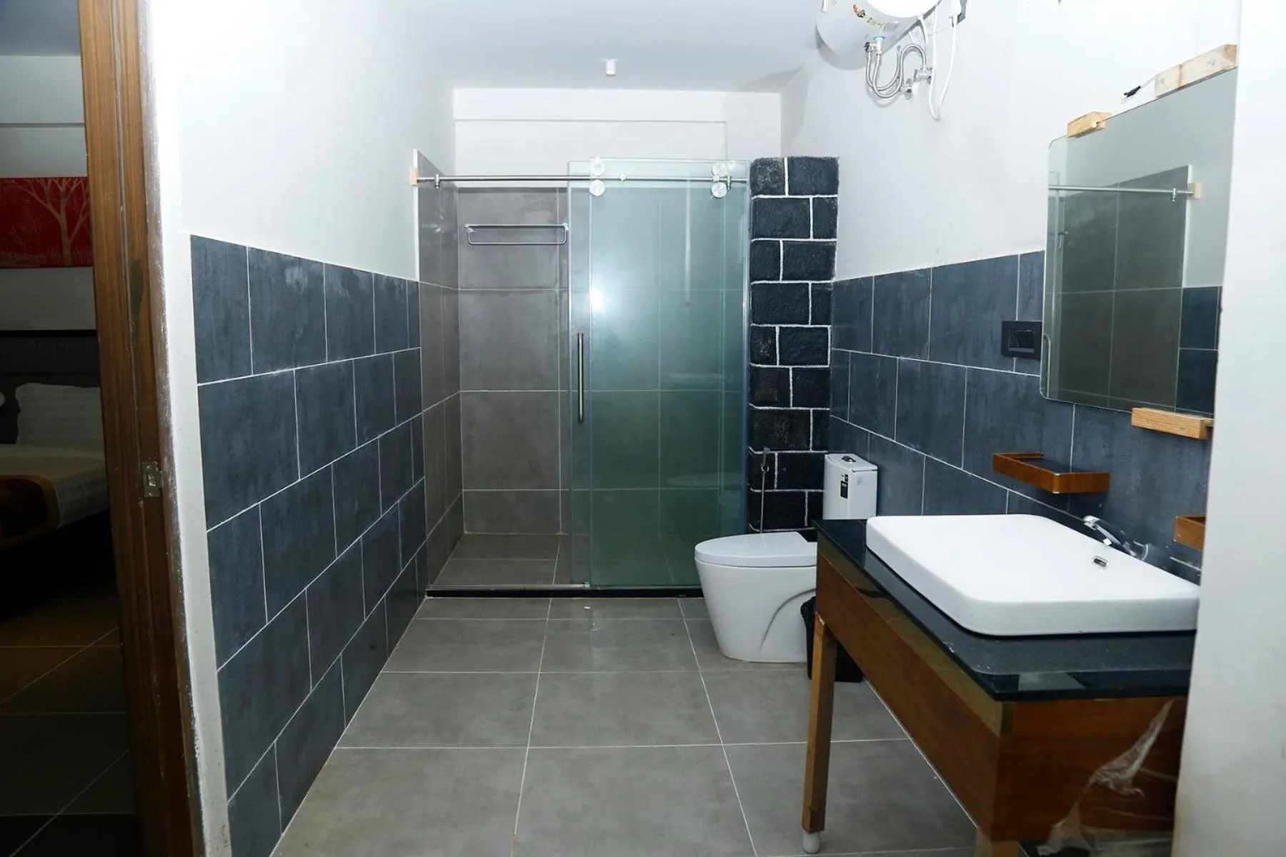 Bathroom in Mainland Resorts & Spa by Kolaahalam