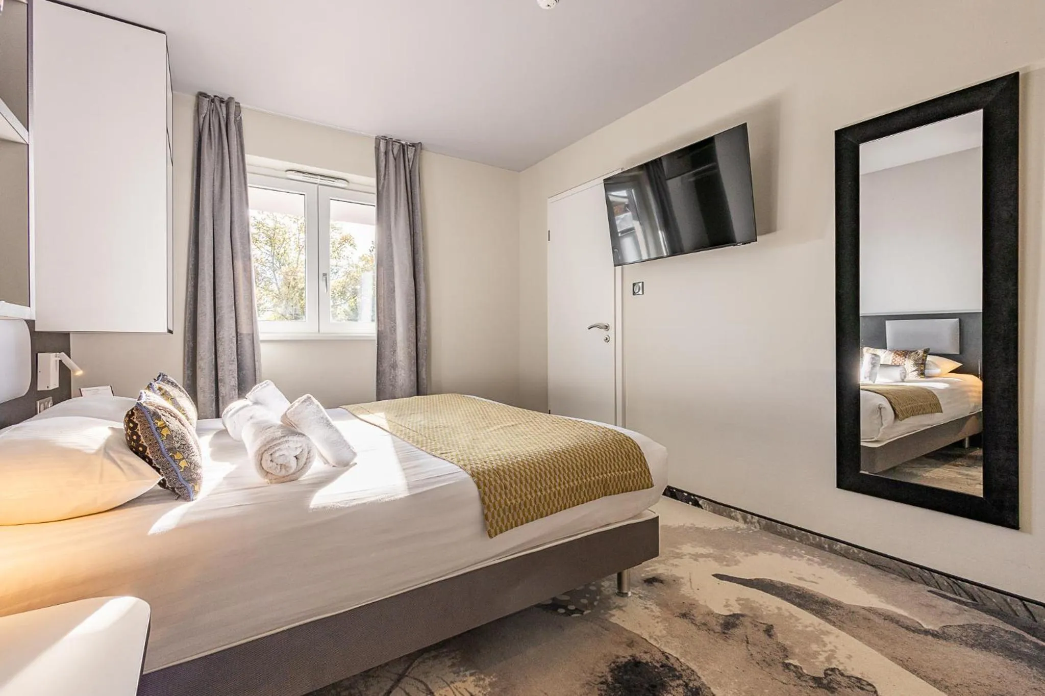 Photo of the whole room, Bed in Brit Hotel, Spa & Restaurant - Colmar Est