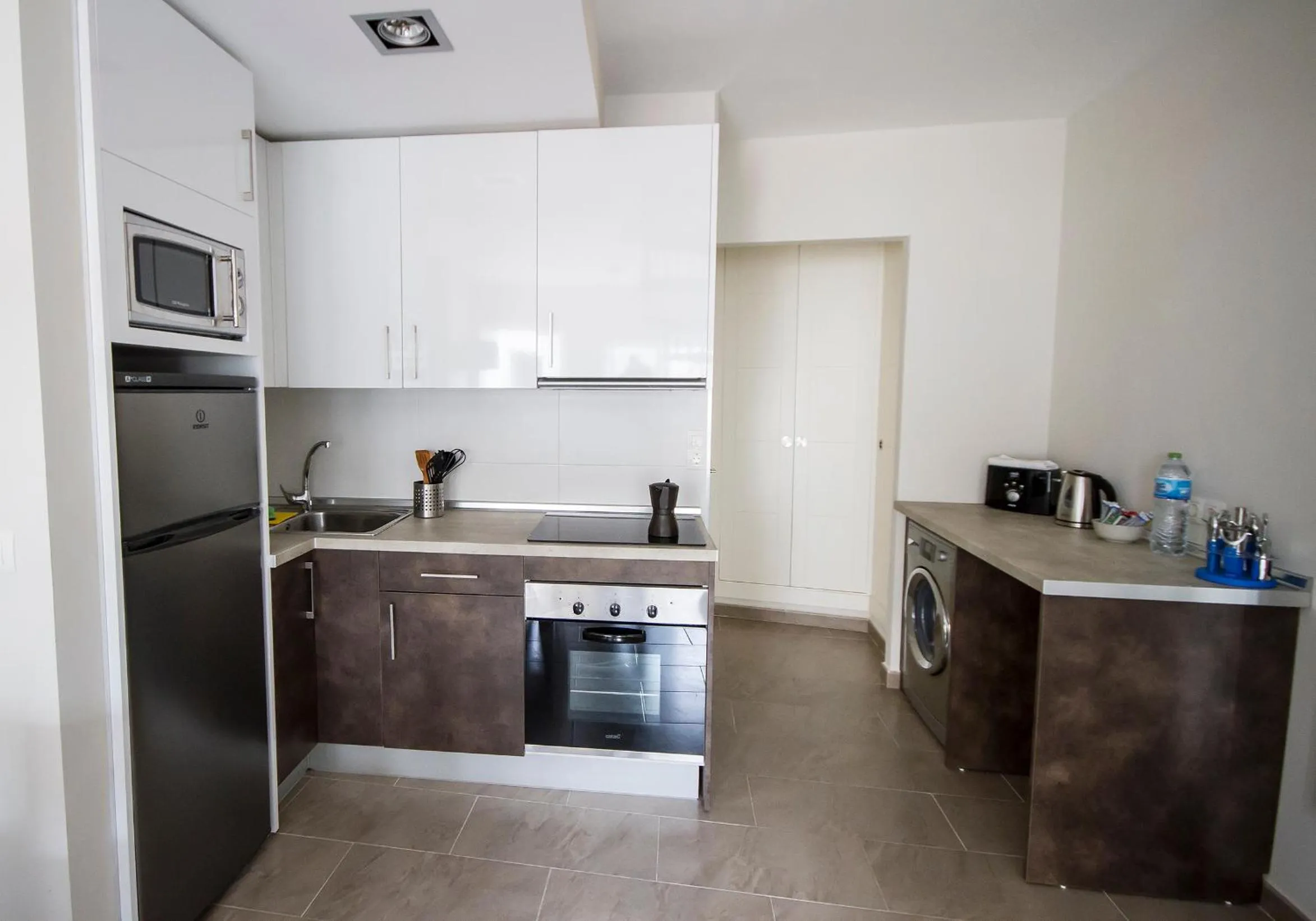 Kitchen or kitchenette in Apartamentos Pinar Malaga Centro