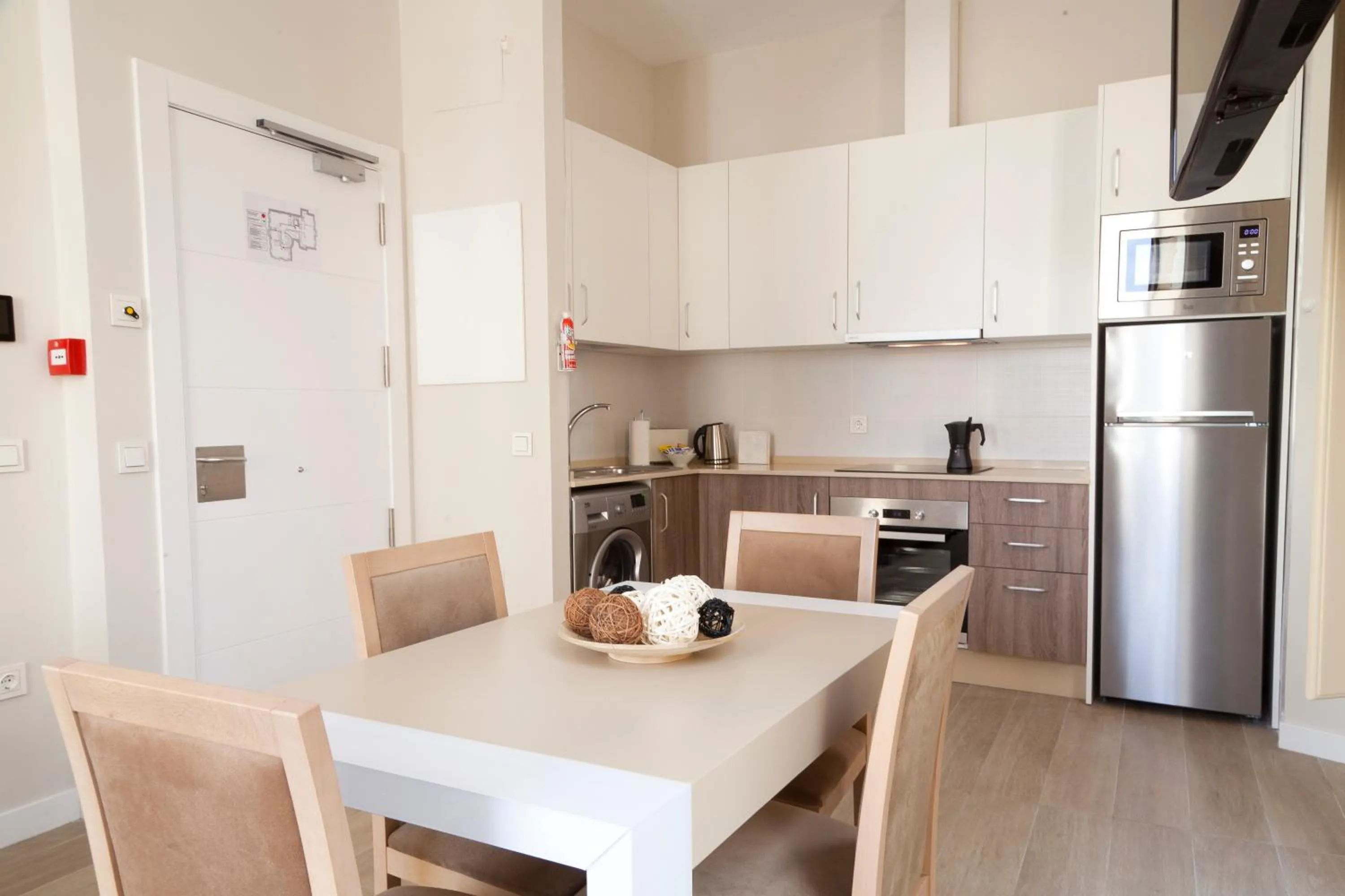 Kitchen or kitchenette in Apartamentos Pinar Malaga Centro