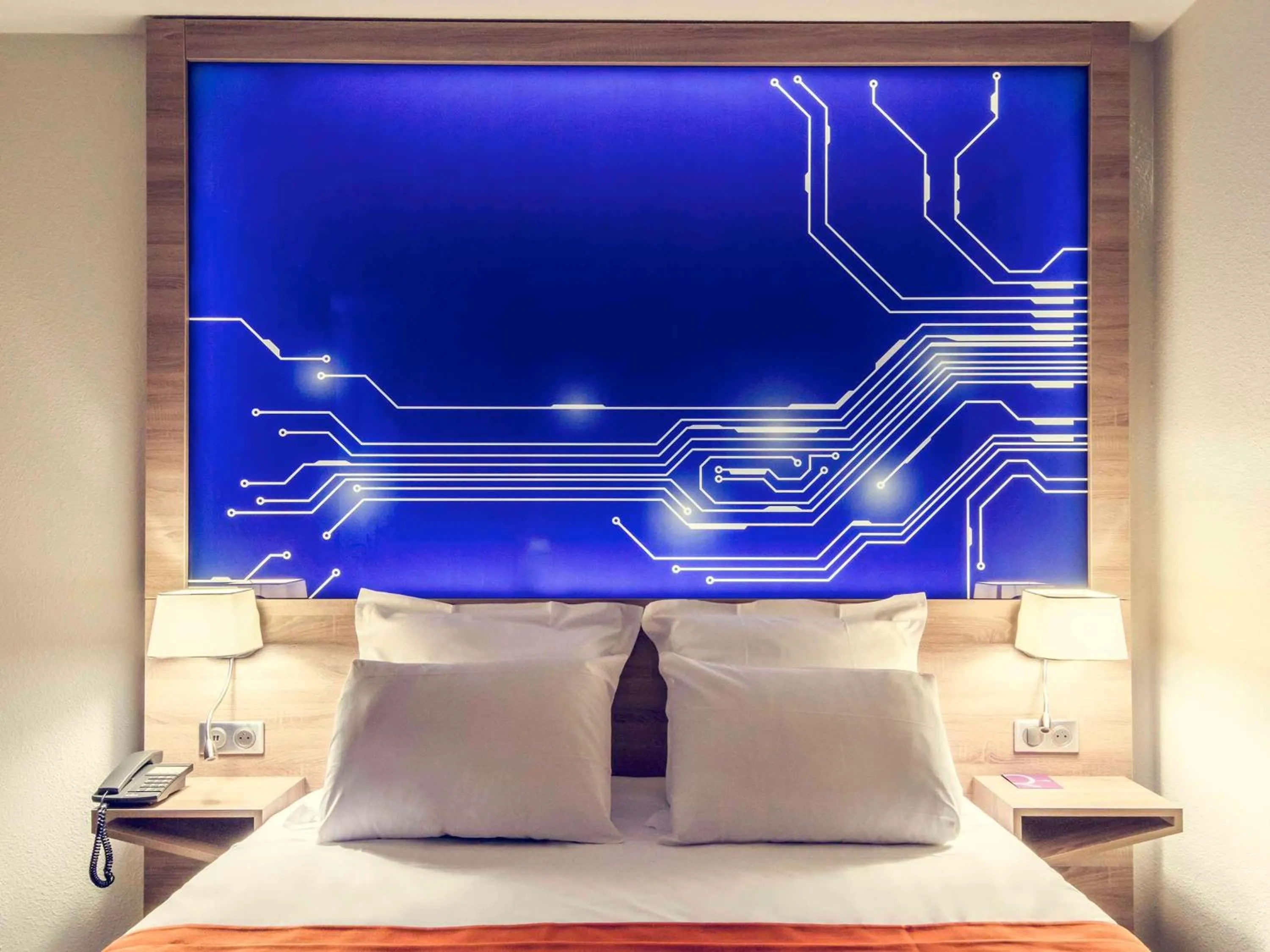 Photo of the whole room, Bed in Mercure Poitiers Site du Futuroscope