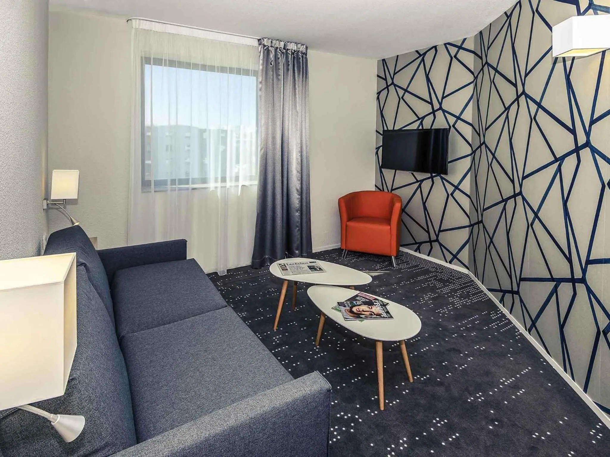 Bedroom in Mercure Poitiers Site du Futuroscope