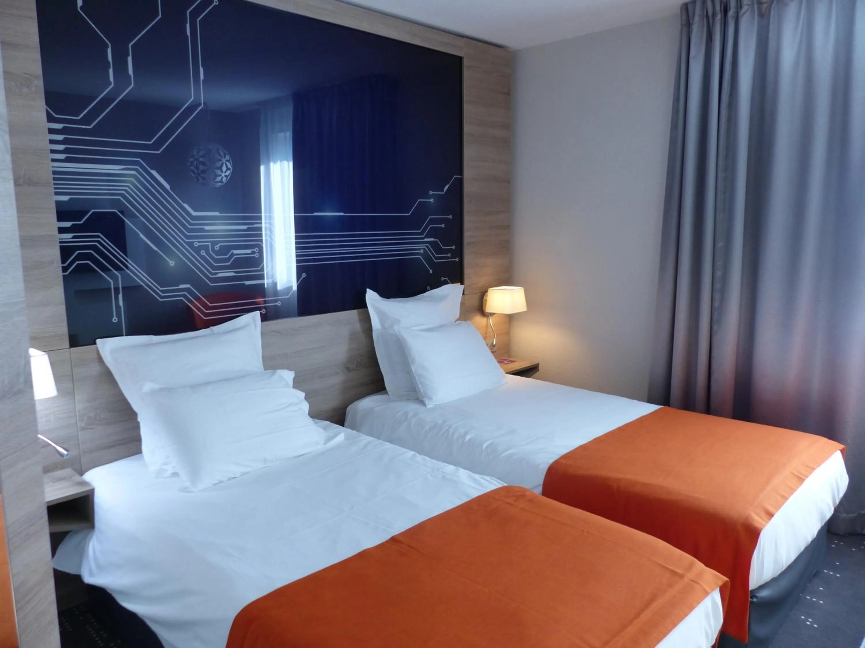 Bed in Mercure Poitiers Site du Futuroscope