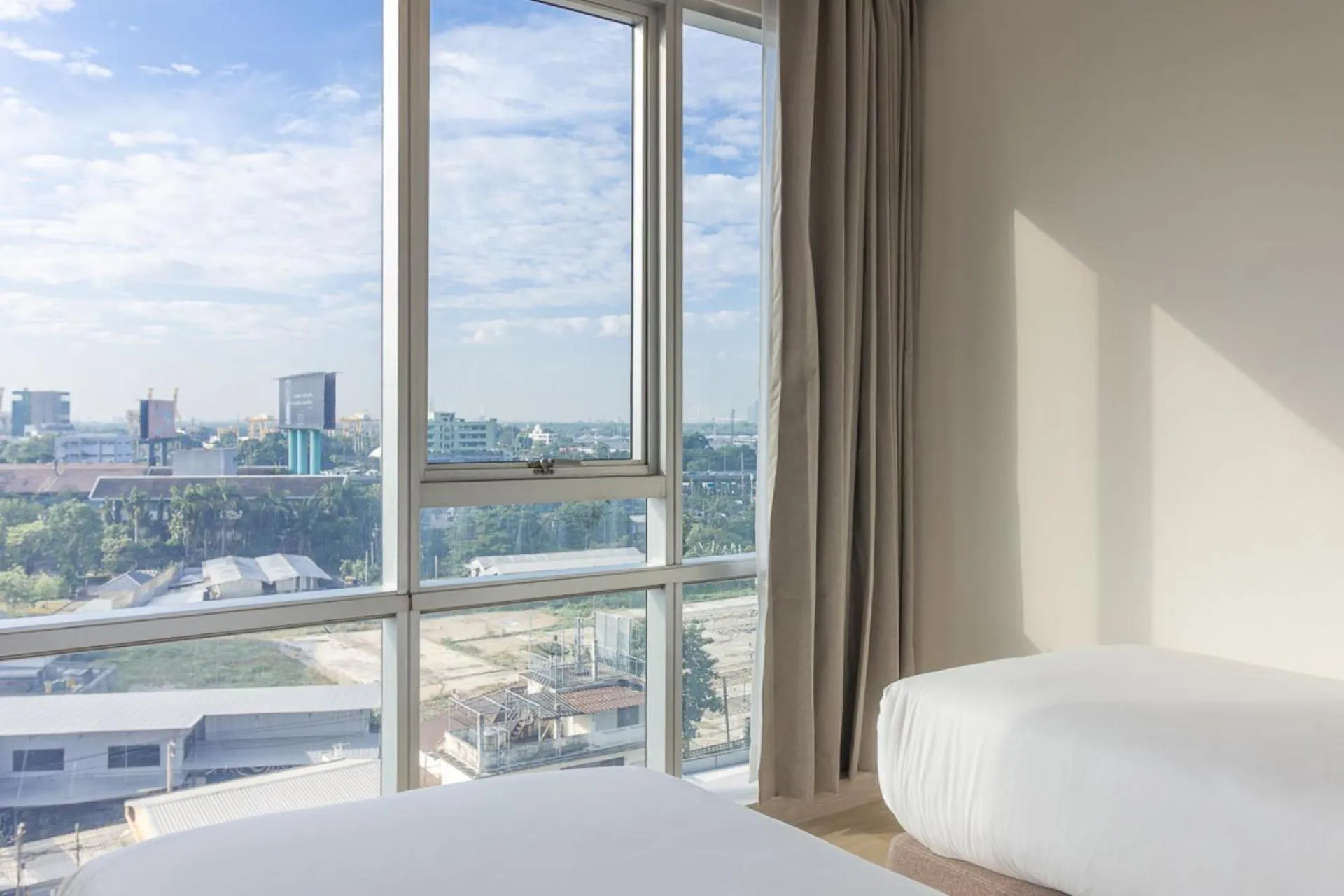 Bed in Jasmine Grande Residence