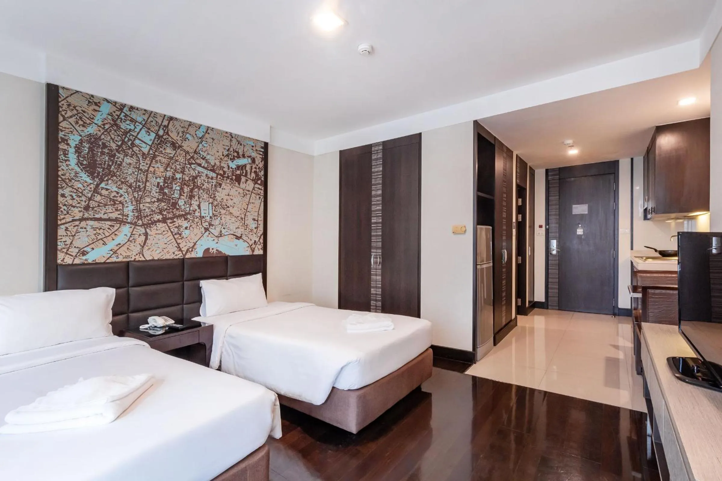 Bed in Jasmine Grande Residence