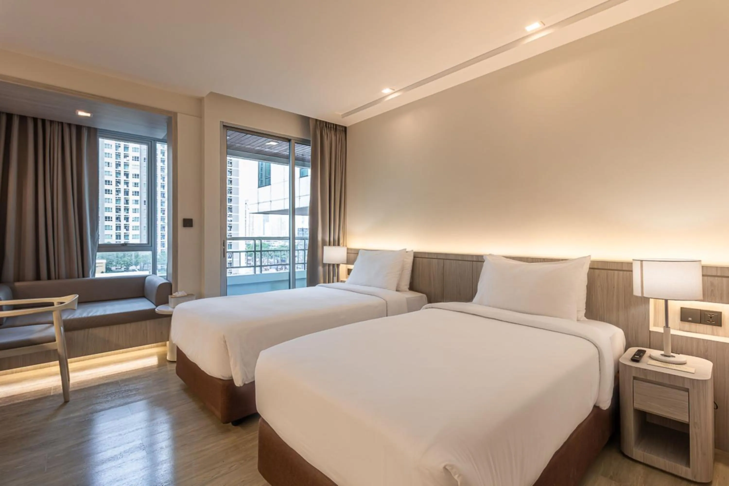 Bed in Jasmine Grande Residence