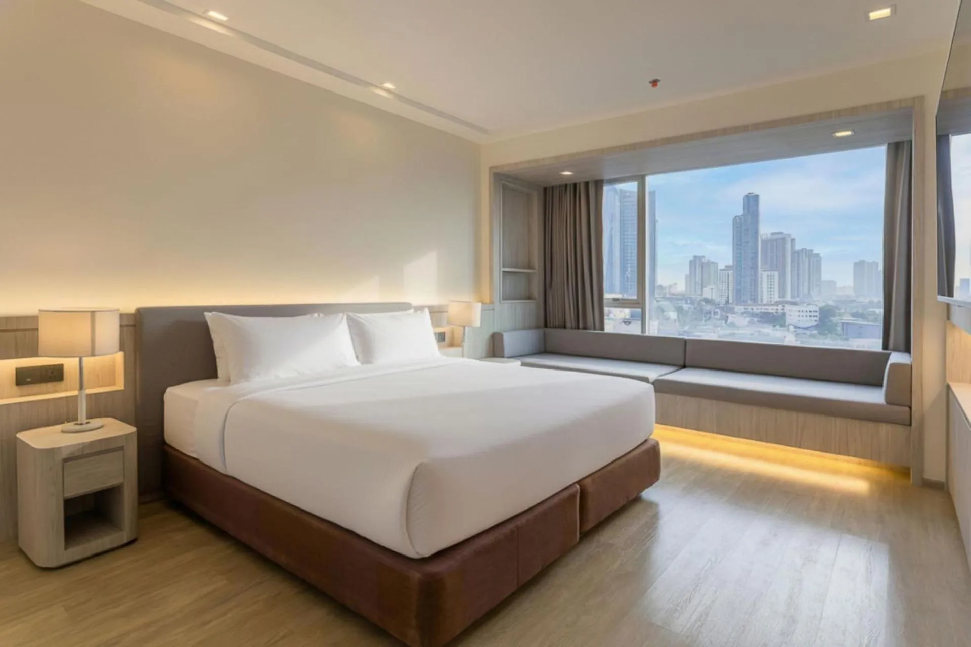 Bed in Jasmine Grande Residence