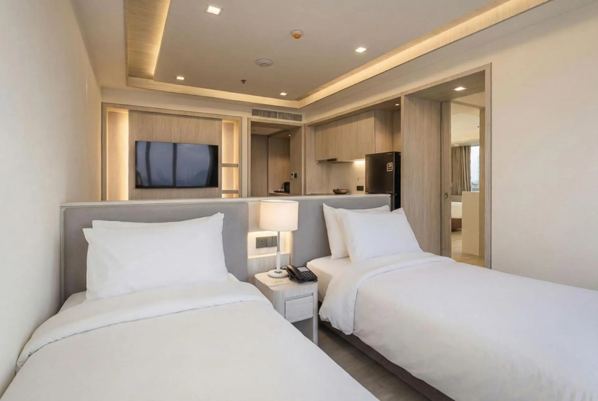 Bed in Jasmine Grande Residence