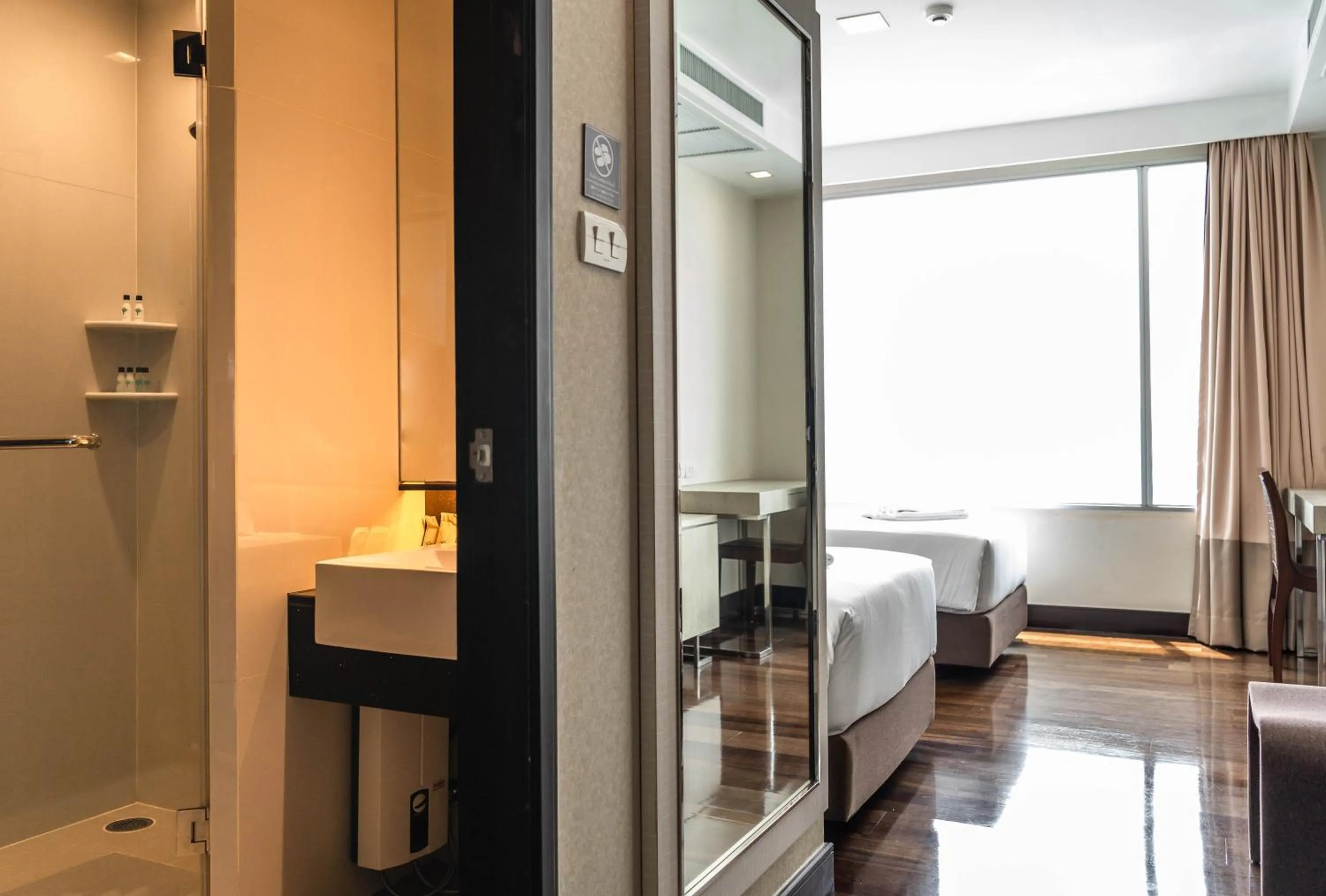 Bed in Jasmine Grande Residence