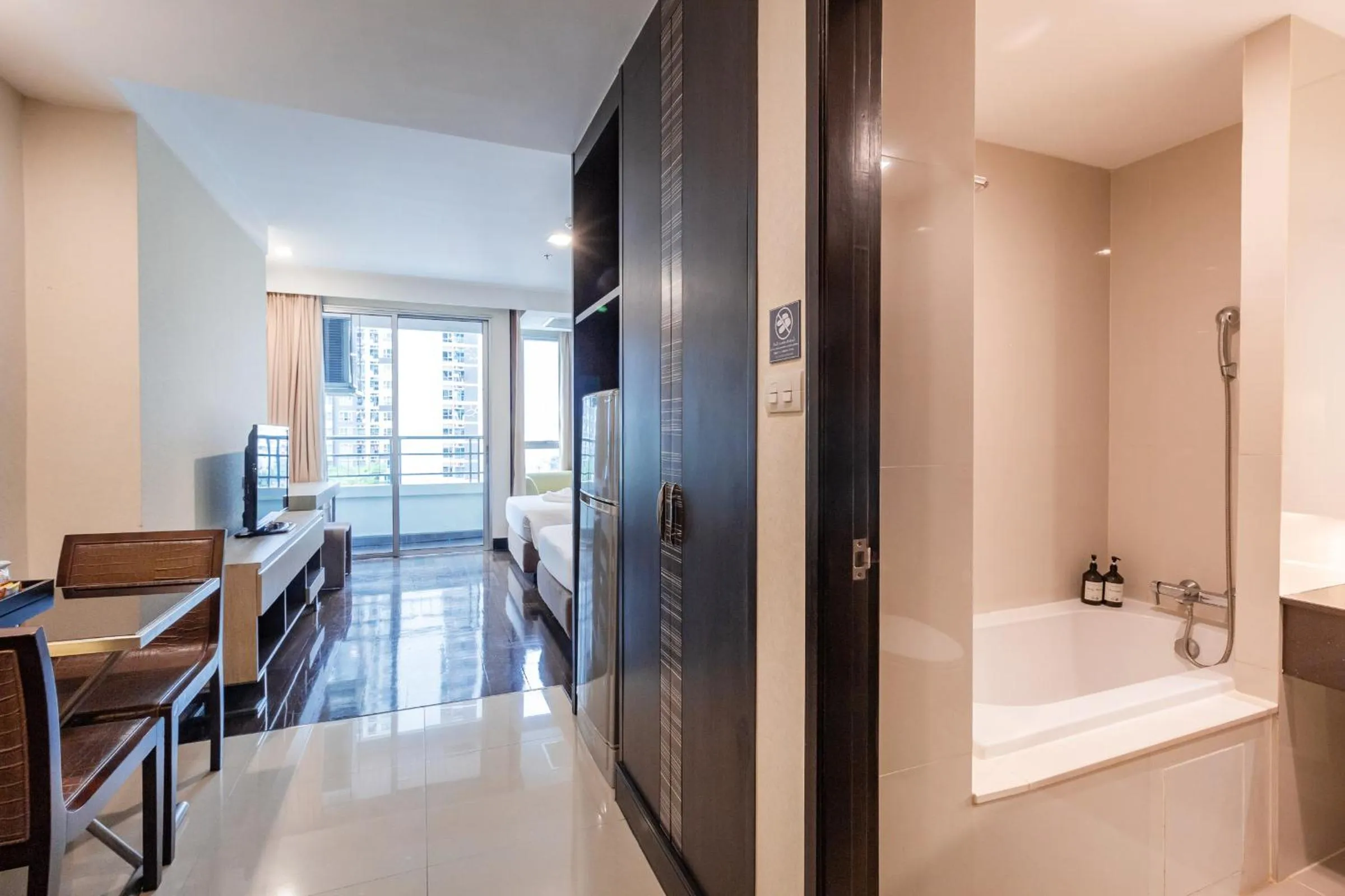 Bed in Jasmine Grande Residence