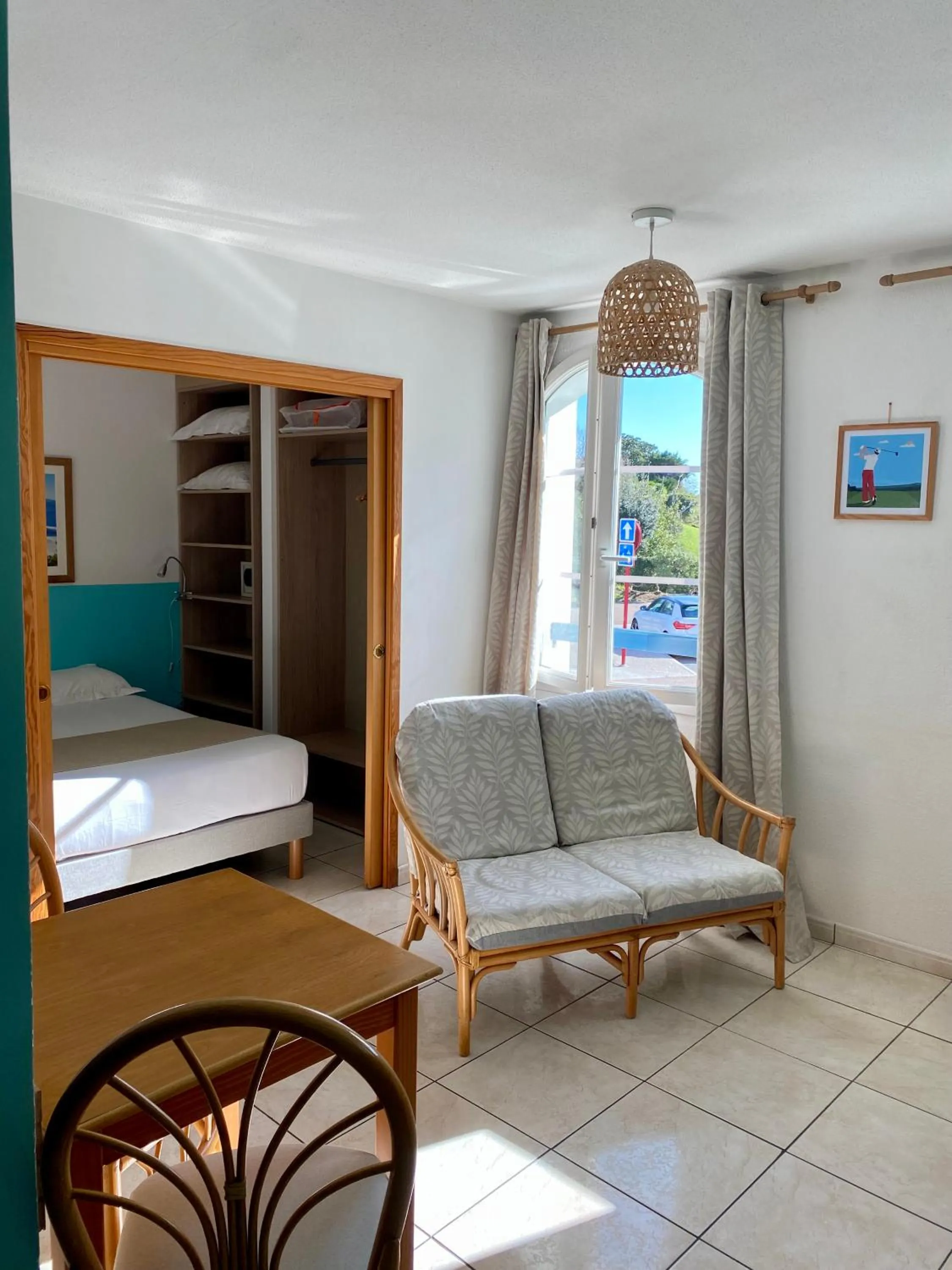 Living room, Bed in Hôtel & Appart-hôtel Olatua