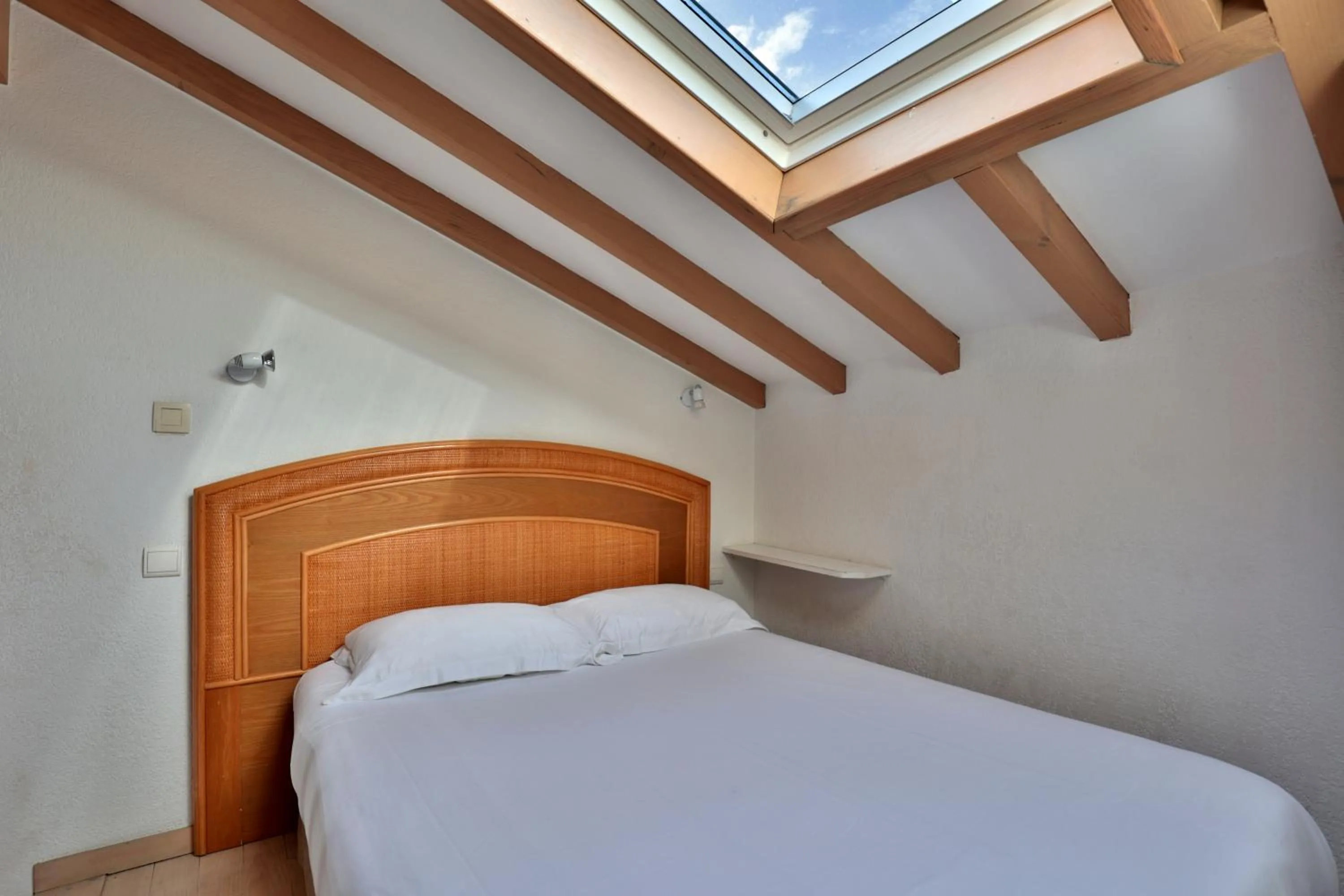 Bed in Hôtel & Appart-hôtel Olatua