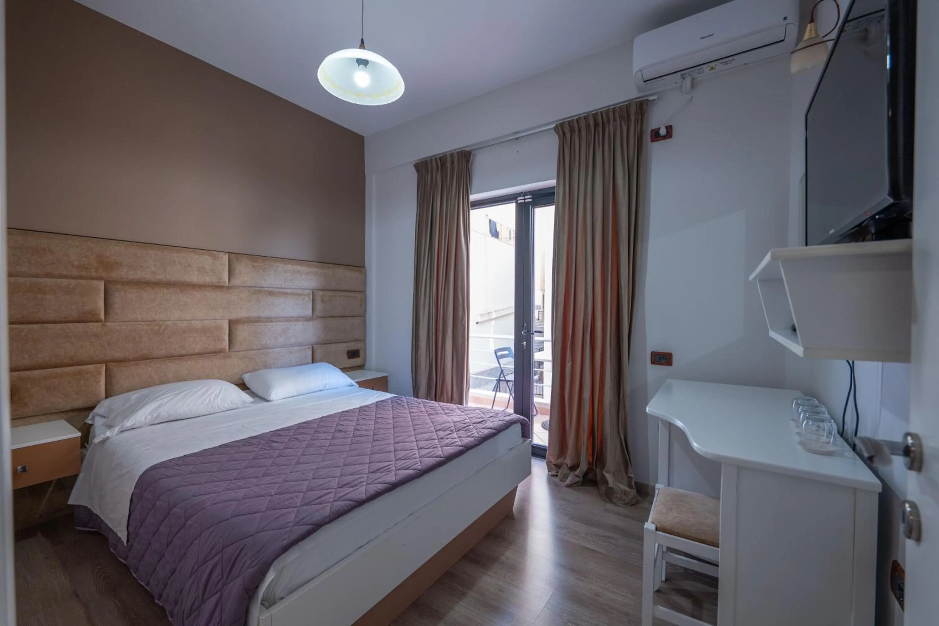 Bed in New Heaven Hotel