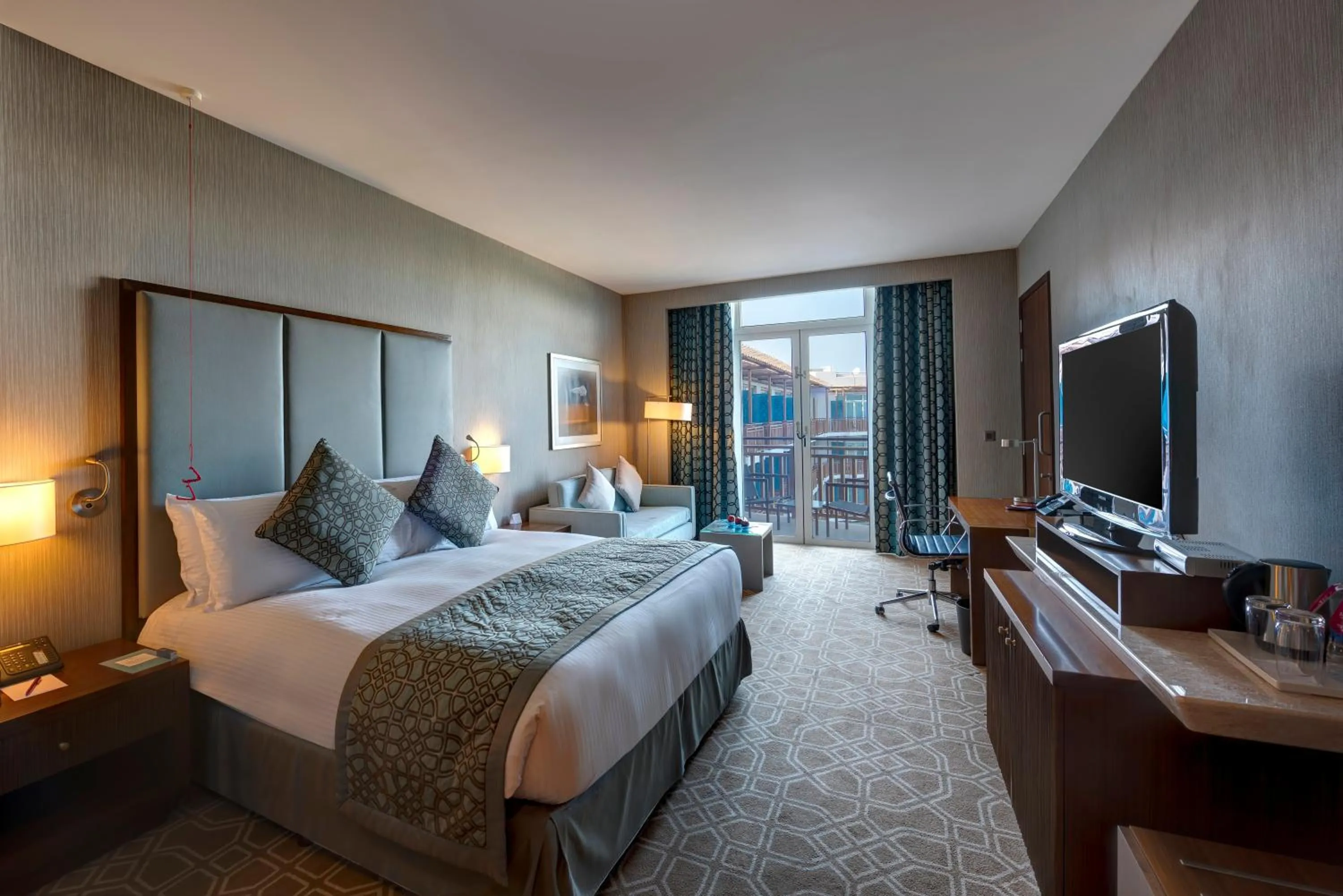 Photo of the whole room, Bed in Crowne Plaza Duqm by IHG