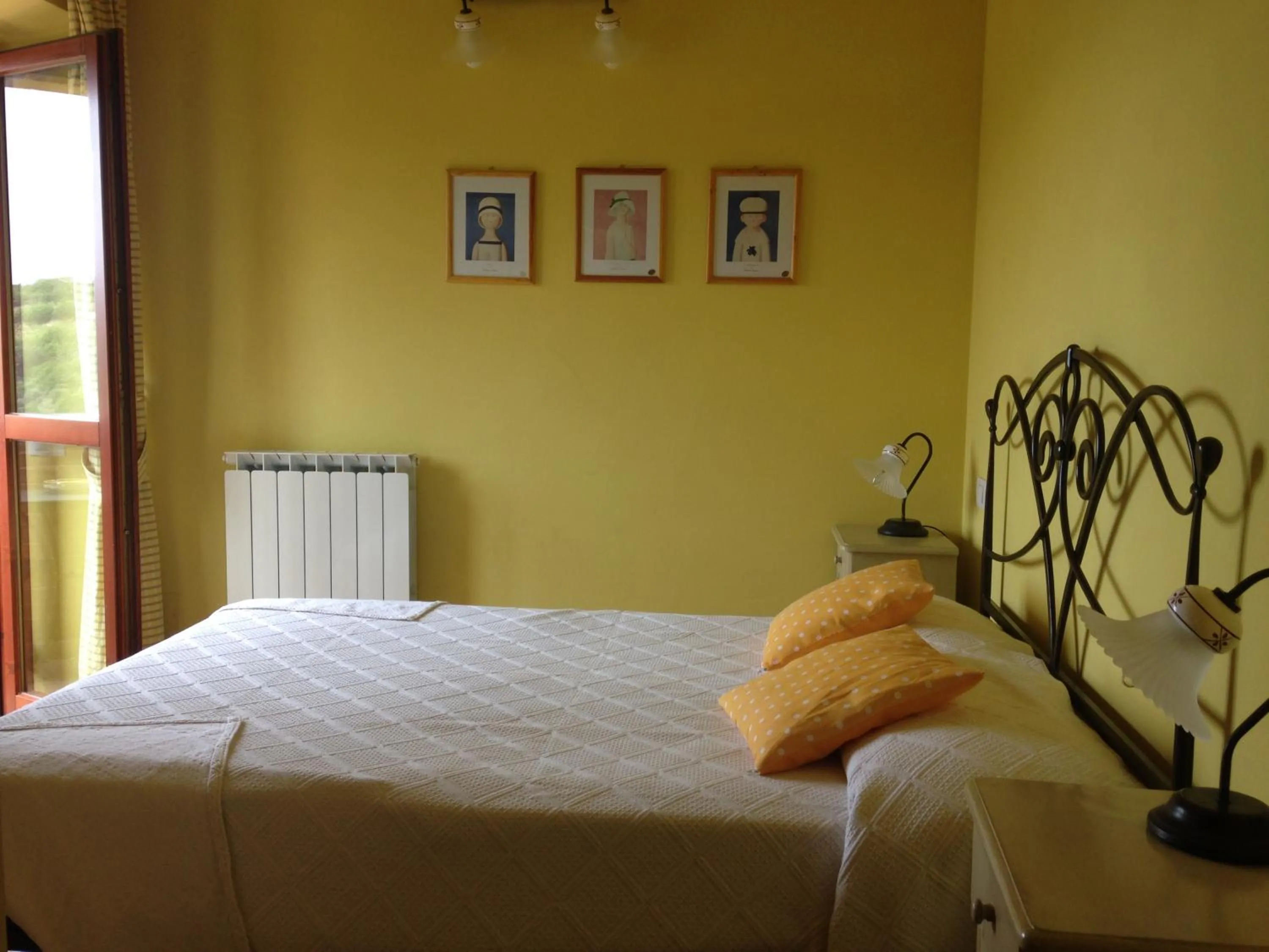 Bed in Cumana Blu Apartments