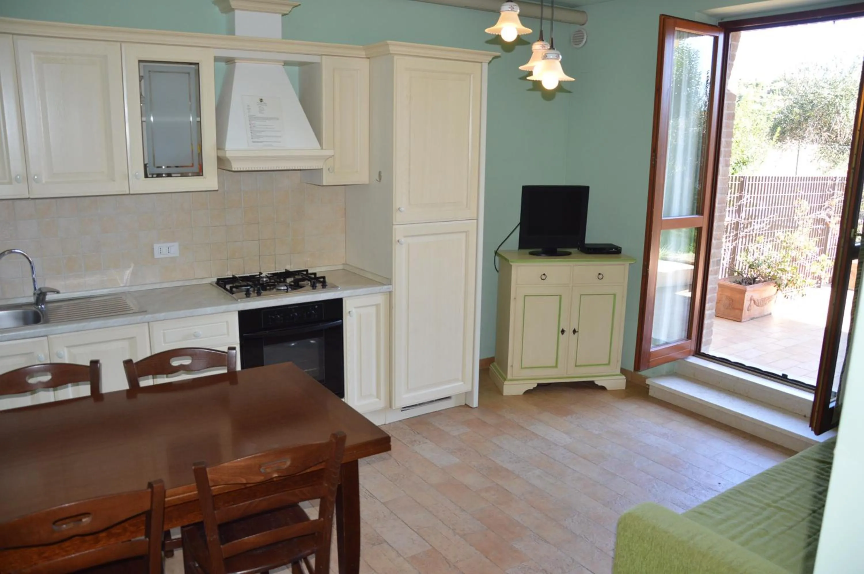 Kitchen or kitchenette in Cumana Blu Apartments