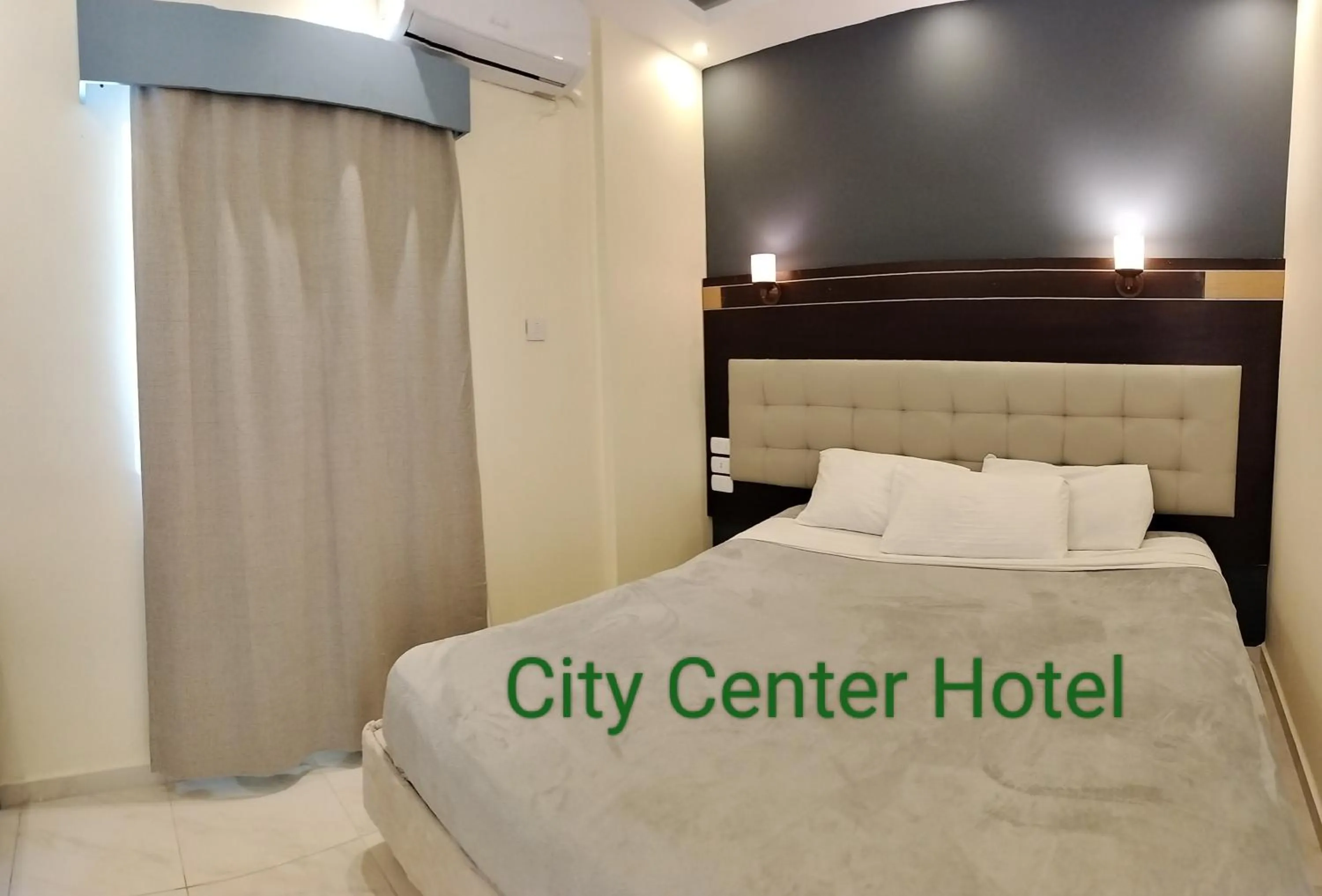 Bed in Petra Town Check-Inn