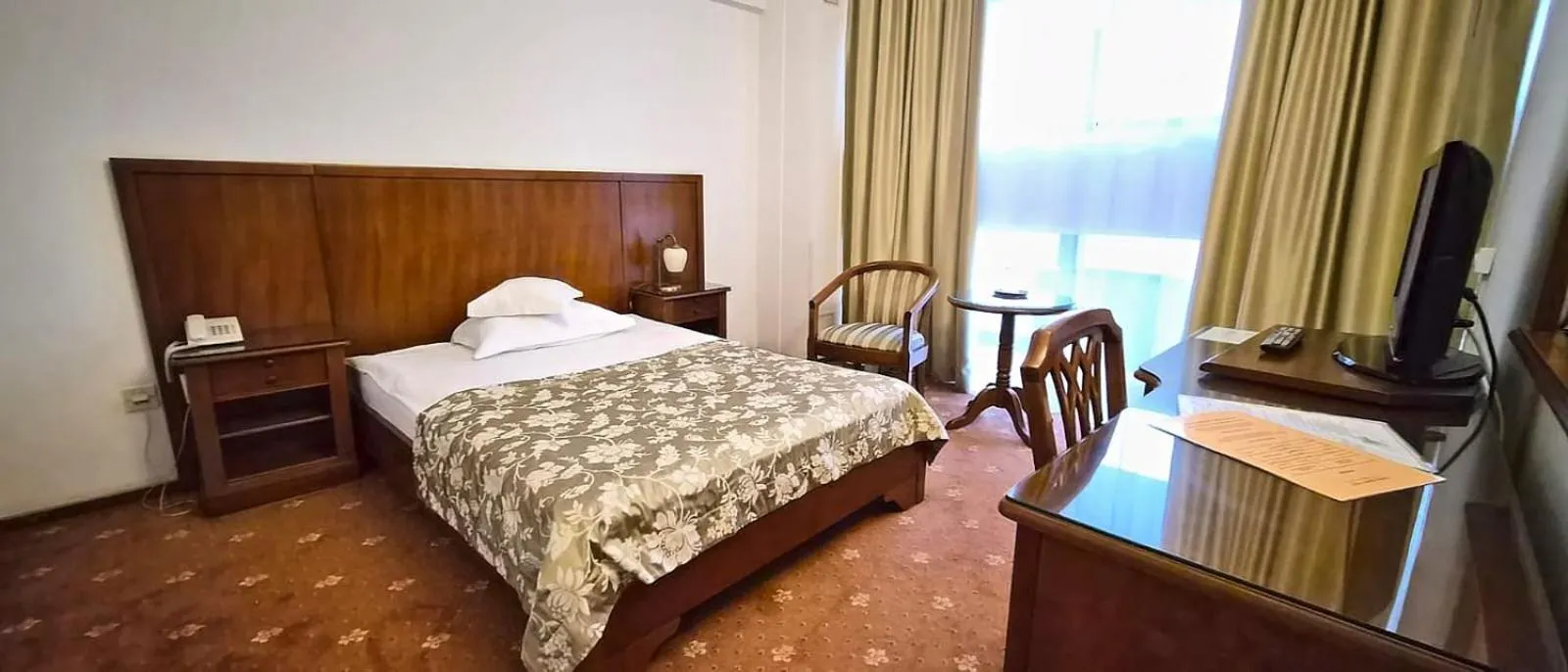 Bed in Hotel Emma West